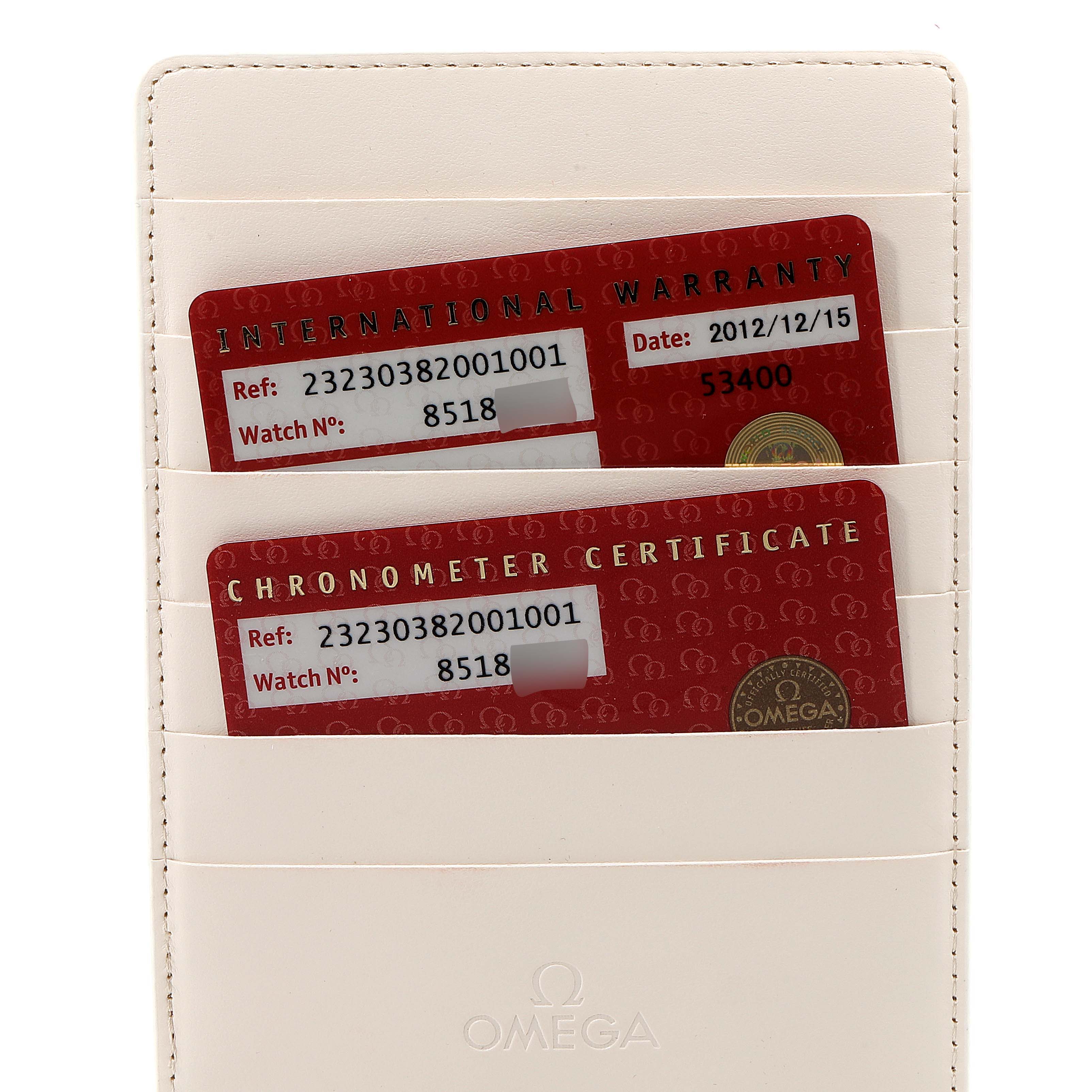 The image shows the International Warranty and Chronometer Certificate cards for the Omega Planet Ocean 232.30.38.20.01.001  Men
s Stainless Steel Black Dial 232.30.38.20.01.001  Men
s Stainless Steel Black Dial model, placed in a cardholder.