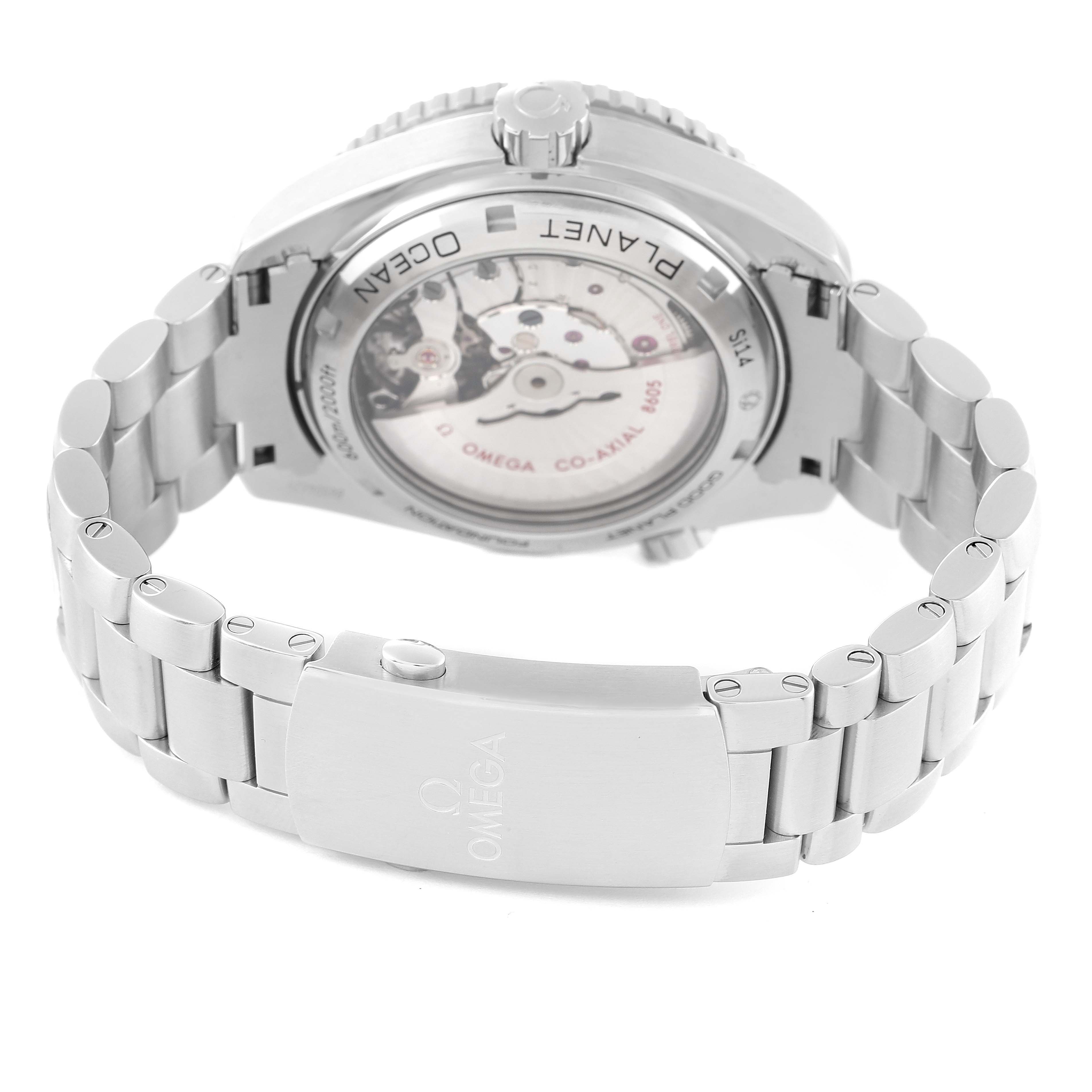 The image shows the back of an Omega Planet Ocean 232.30.44.22.03.001 Men's Stainless Steel Blue Dial 232.30.44.22.03.001 Men's Stainless Steel Blue Dial watch, highlighting the movement and metal bracelet.