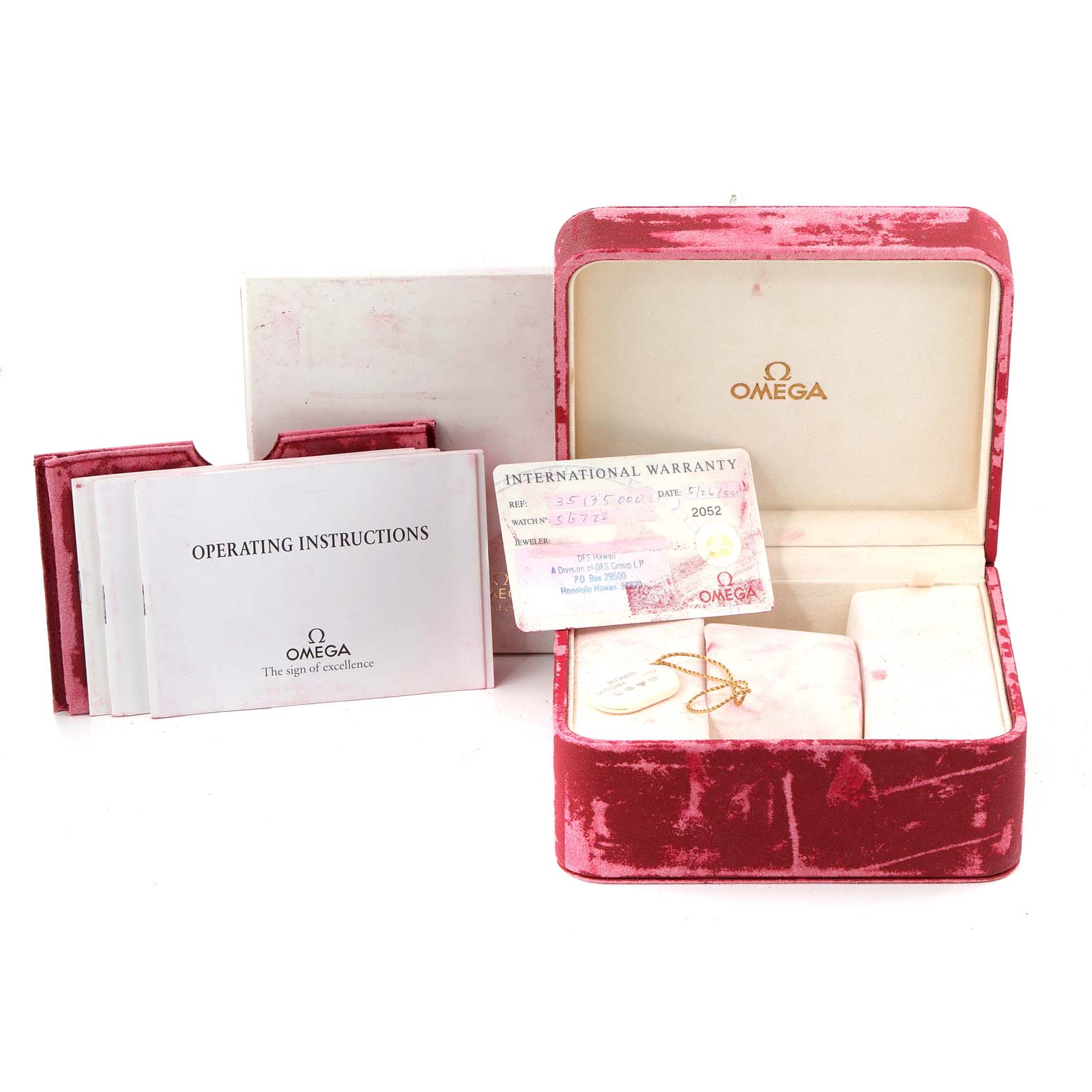 This image shows the Omega Speedmaster 3513.50.00 Men
s Stainless Steel Black Dial 3513.50.00 Men
s Stainless Steel Black Dial watch accessories, including the box, operating instructions, and international warranty card.