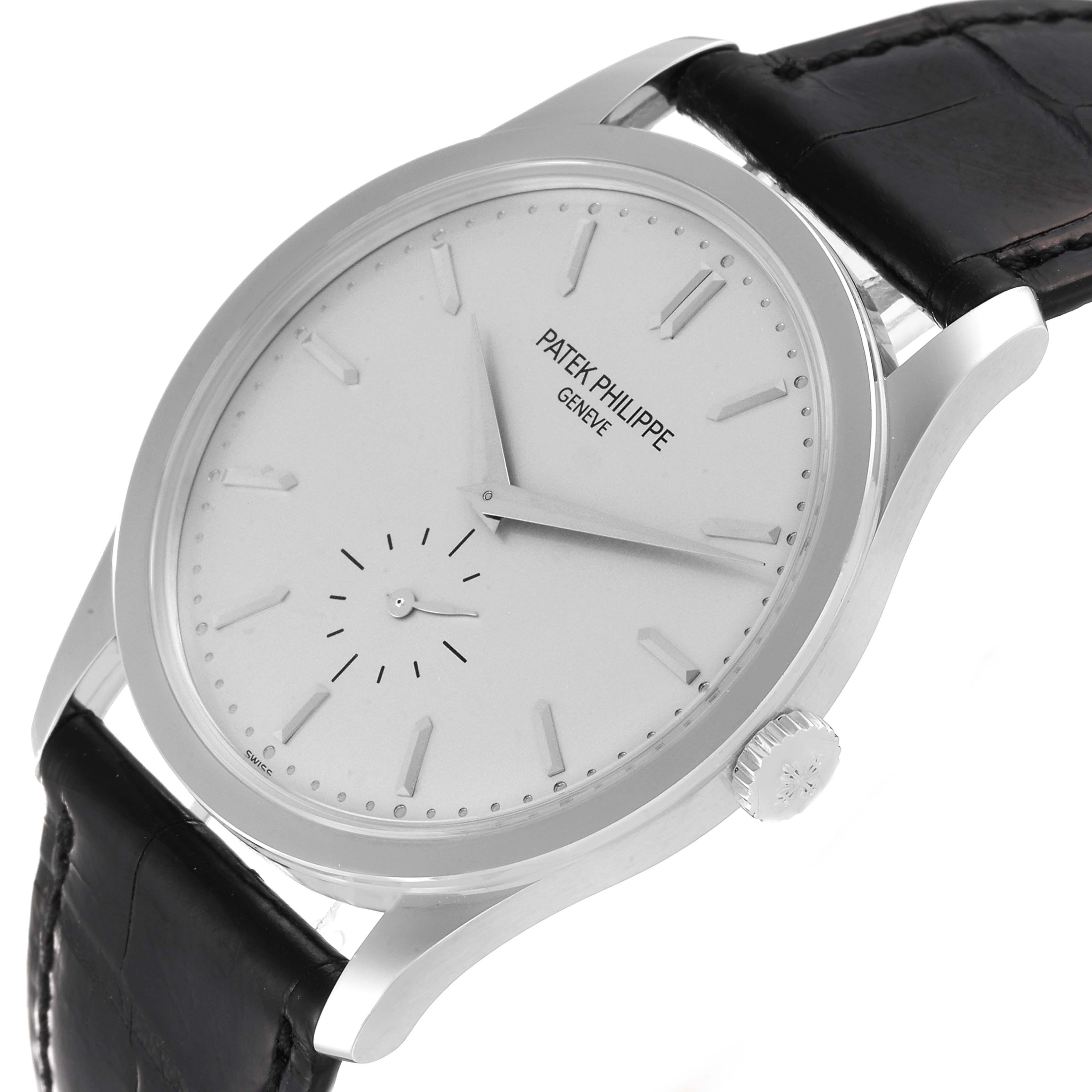 The image shows a close-up angle of the Calatrava model by Patek Philippe, highlighting the face, dial, and crown.