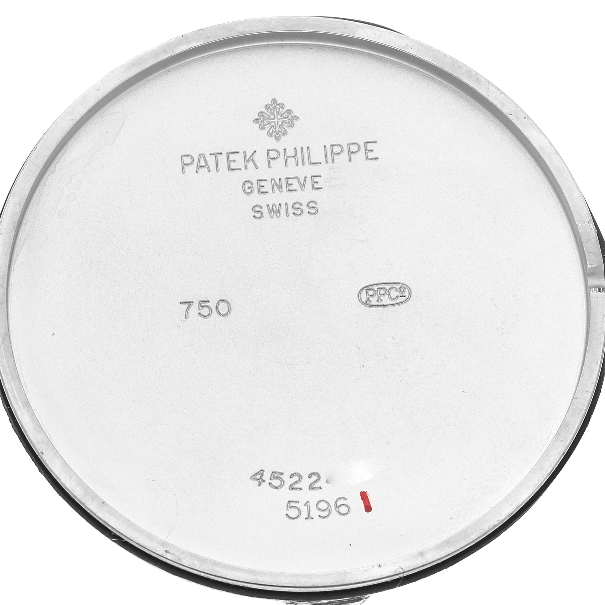 This image shows the inner case back of a Patek Philippe Calatrava 5196G Men
s White Gold Silver Dial 5196G Men
s White Gold Silver Dial watch model, displaying inscriptions and hallmarks.
