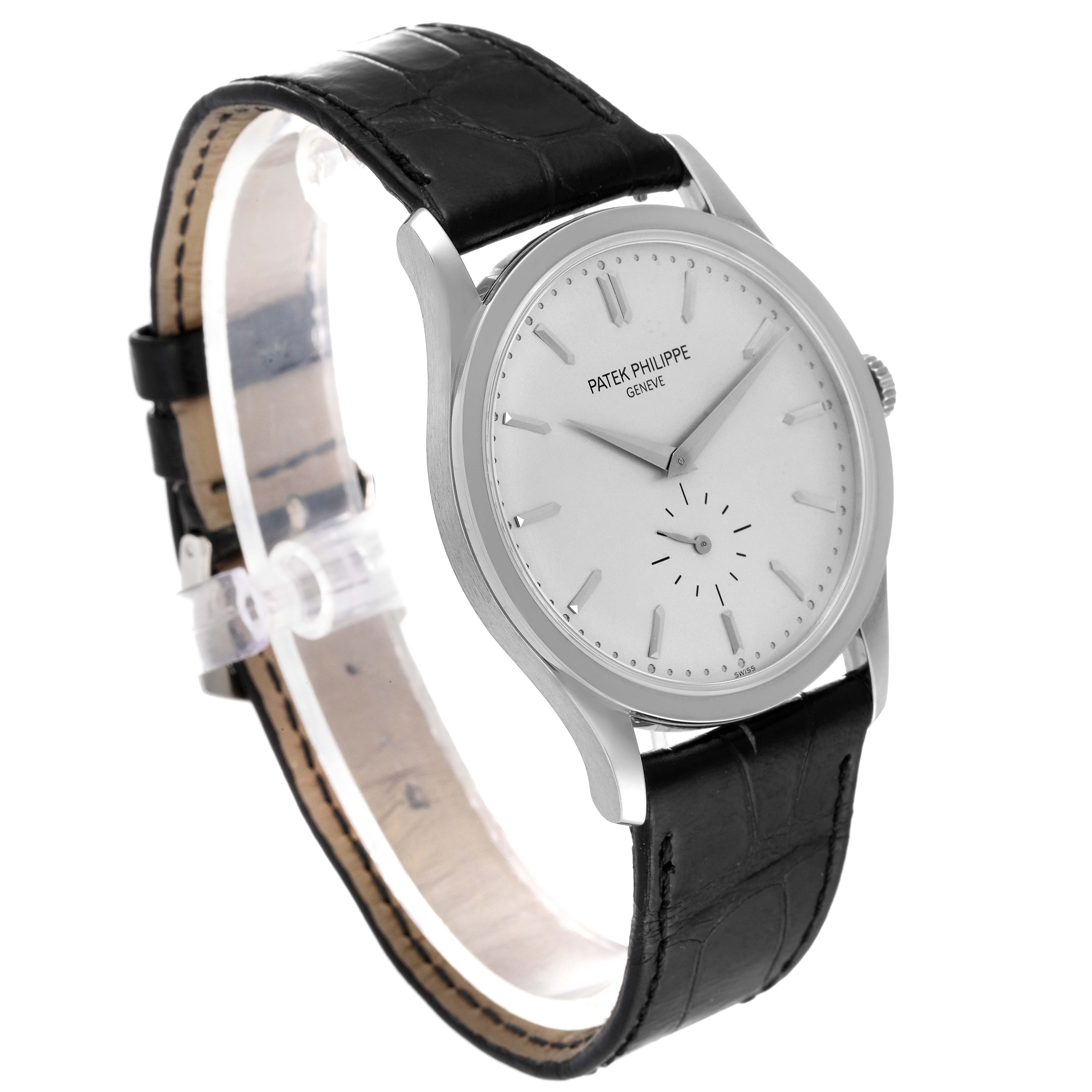 The image shows a front-side view of the Patek Philippe Calatrava 5196G Men
s White Gold Silver Dial 5196G Men
s White Gold Silver Dial watch with a black leather strap.