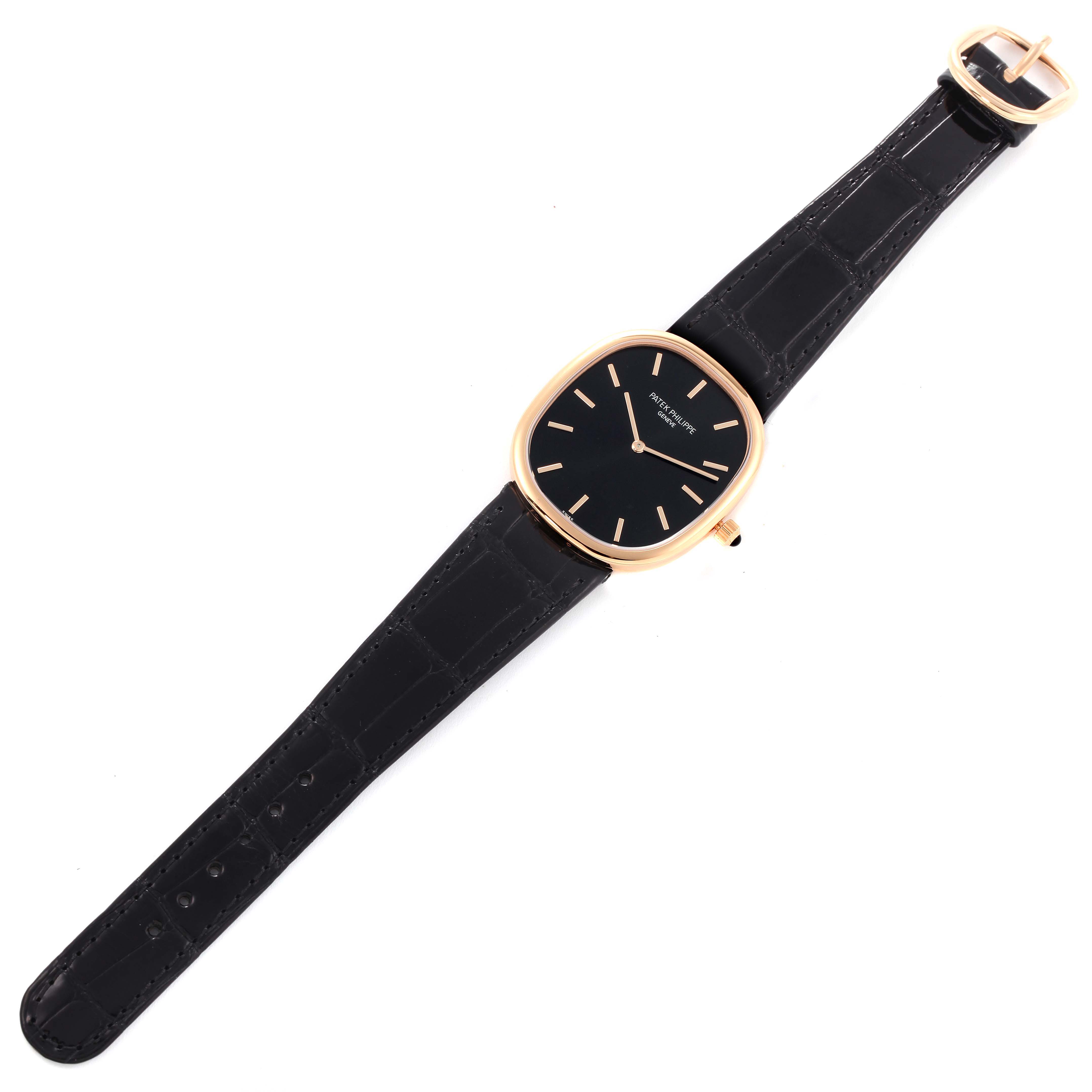 This image shows the full watchband and face of the Patek Philippe Golden Ellipse 5738 Men's Rose Gold Black Dial 5738 Men's Rose Gold Black Dial model, viewed from above.