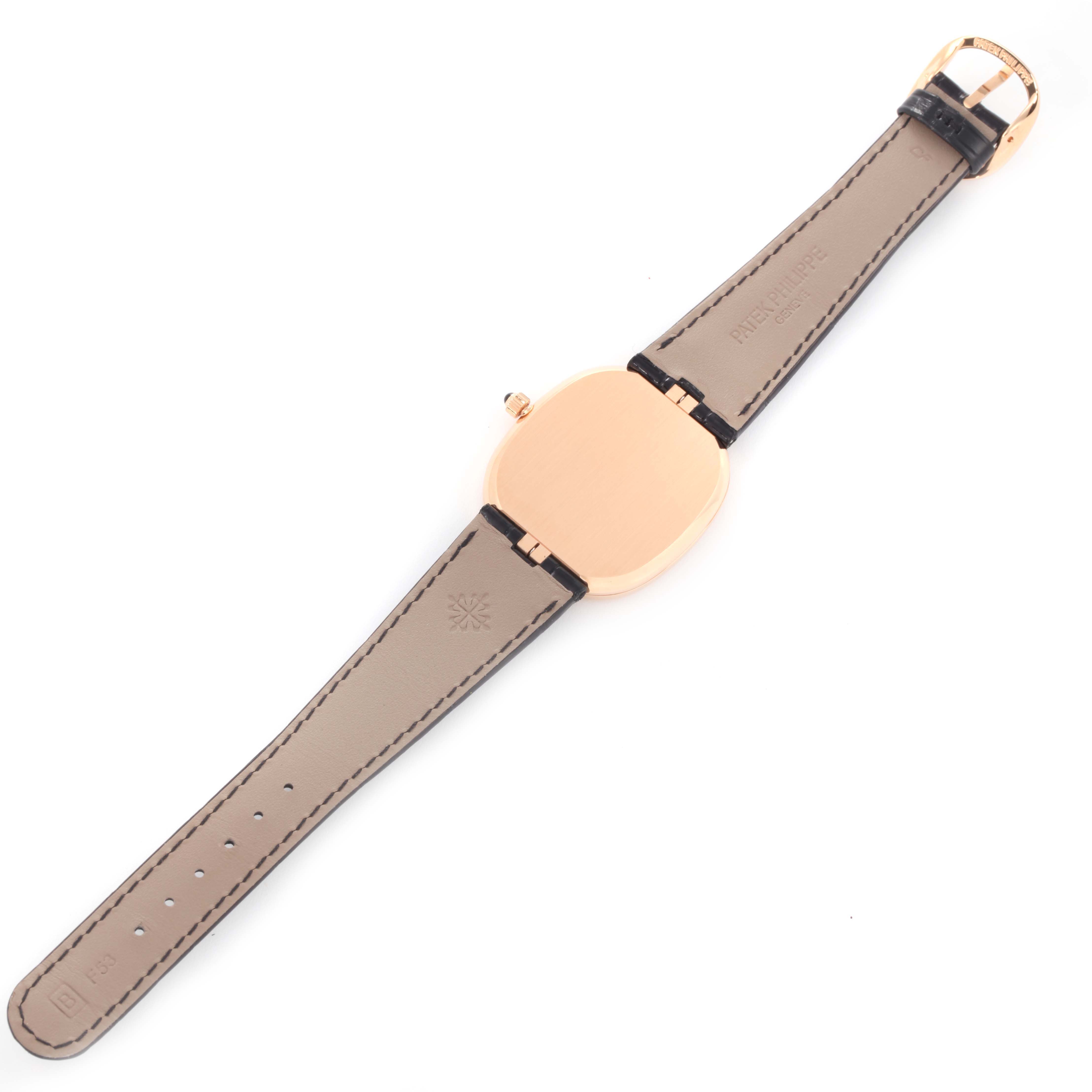 The image shows the back view of a Patek Philippe Golden Ellipse 5738 Men's Rose Gold Black Dial 5738 Men's Rose Gold Black Dial watch, highlighting the strap and case back.