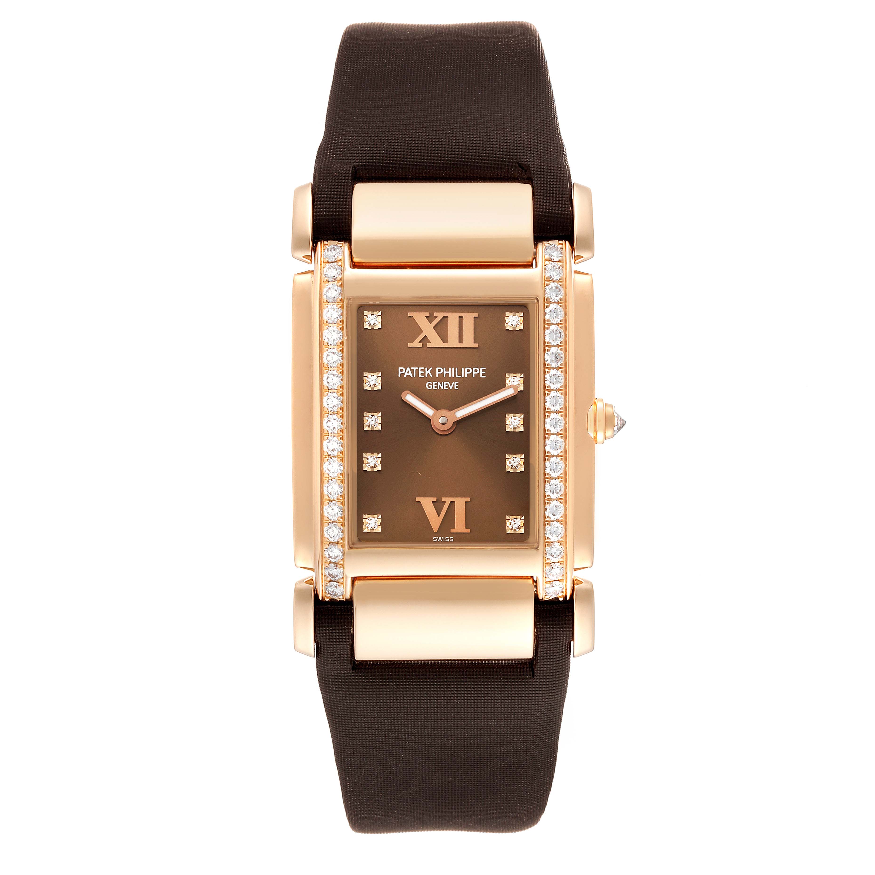 The image shows a front view of the Patek Philippe Twenty-4 4920R-10 Women's Rose Gold Brown Dial 4920R-10 Women's Rose Gold Brown Dial watch, featuring a rectangular face, diamond edges, and a black strap.