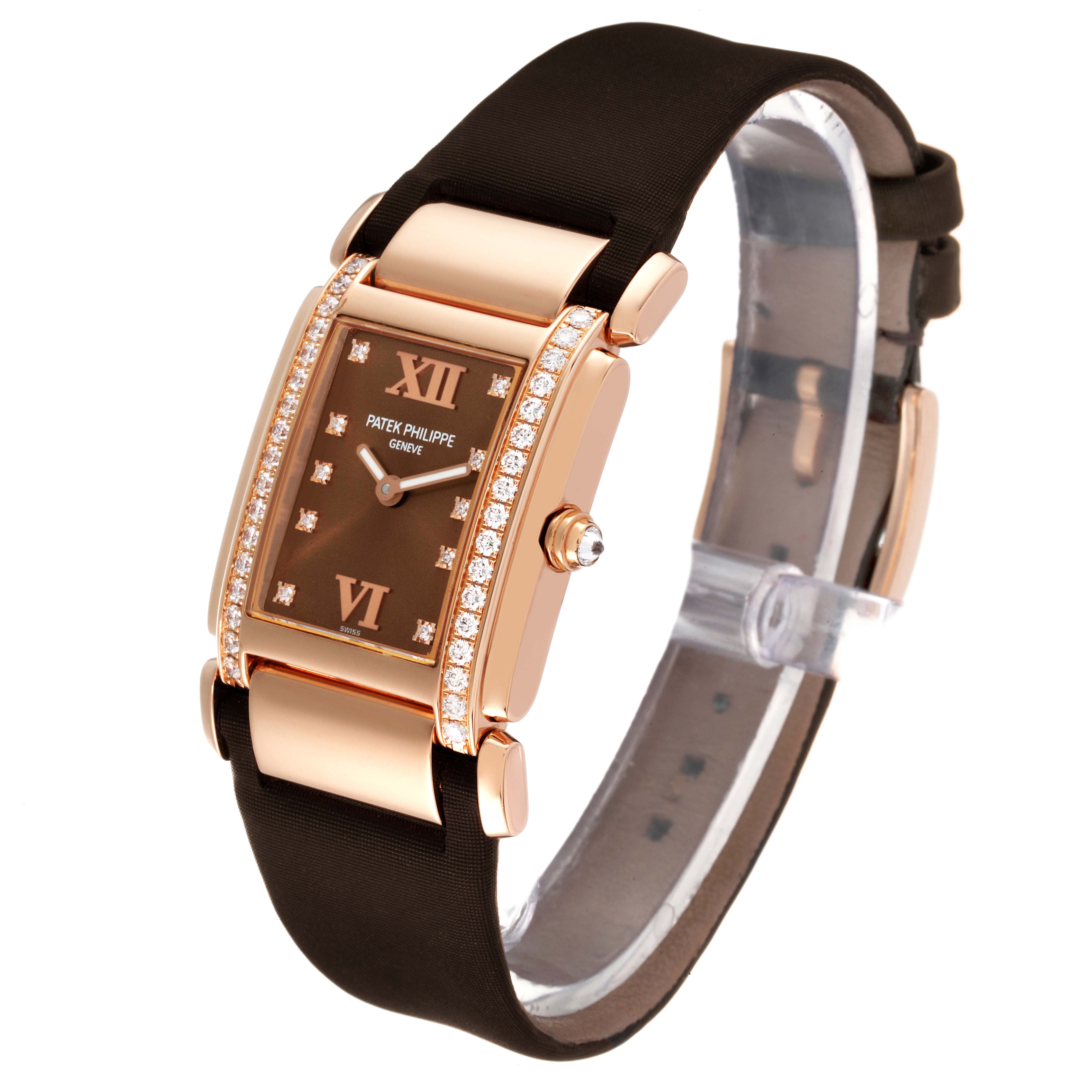 The Patek Philippe Twenty-4 4920R-10 Women's Rose Gold Brown Dial 4920R-10 Women's Rose Gold Brown Dial watch is shown at an oblique angle highlighting the face, bezel, strap, and side crown.