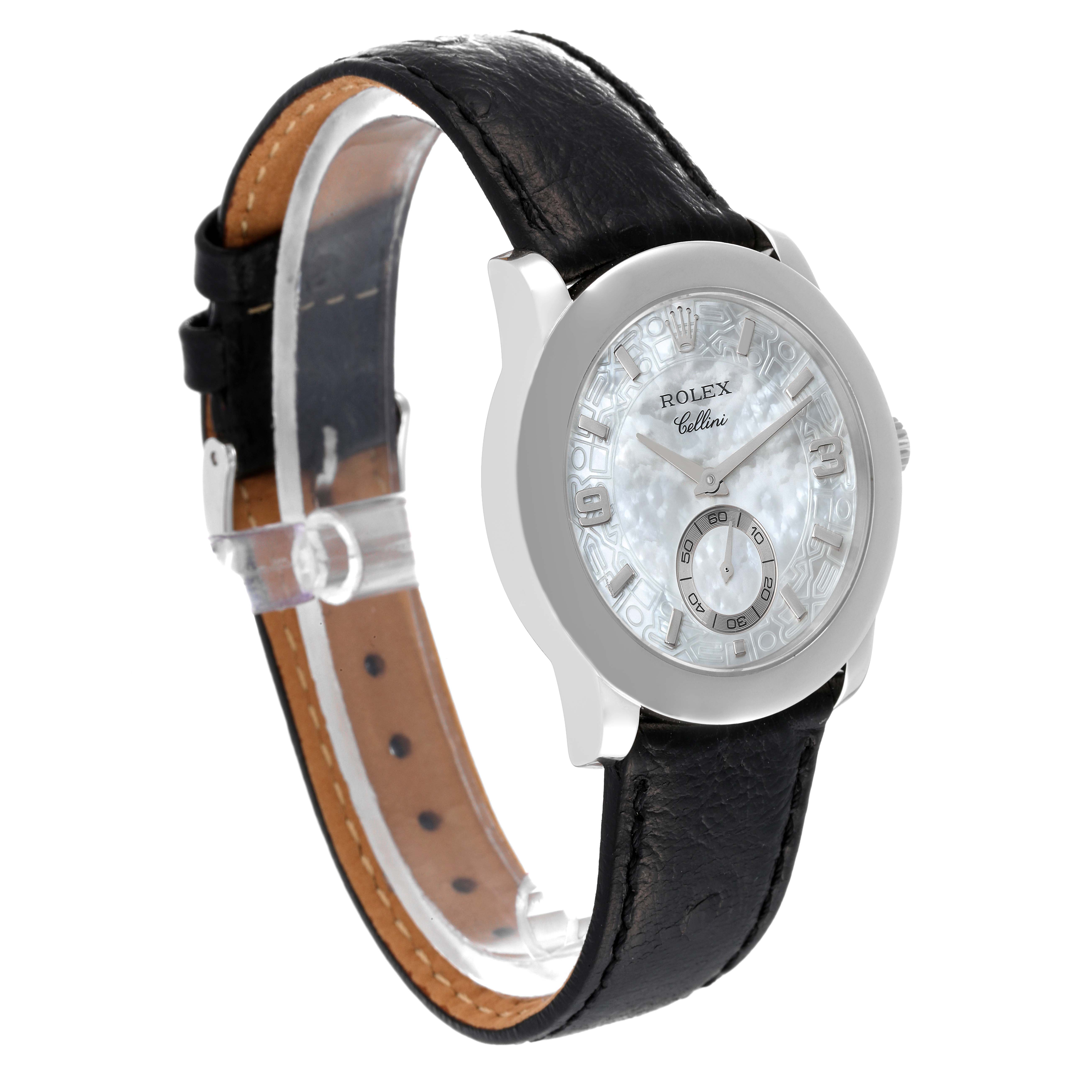 This image shows a side angle of the Rolex Cellini 5240 Men's Platinum Mother of Pearl Dial 5240 Men's Platinum Mother of Pearl Dial watch with a black leather strap and a detailed face.
