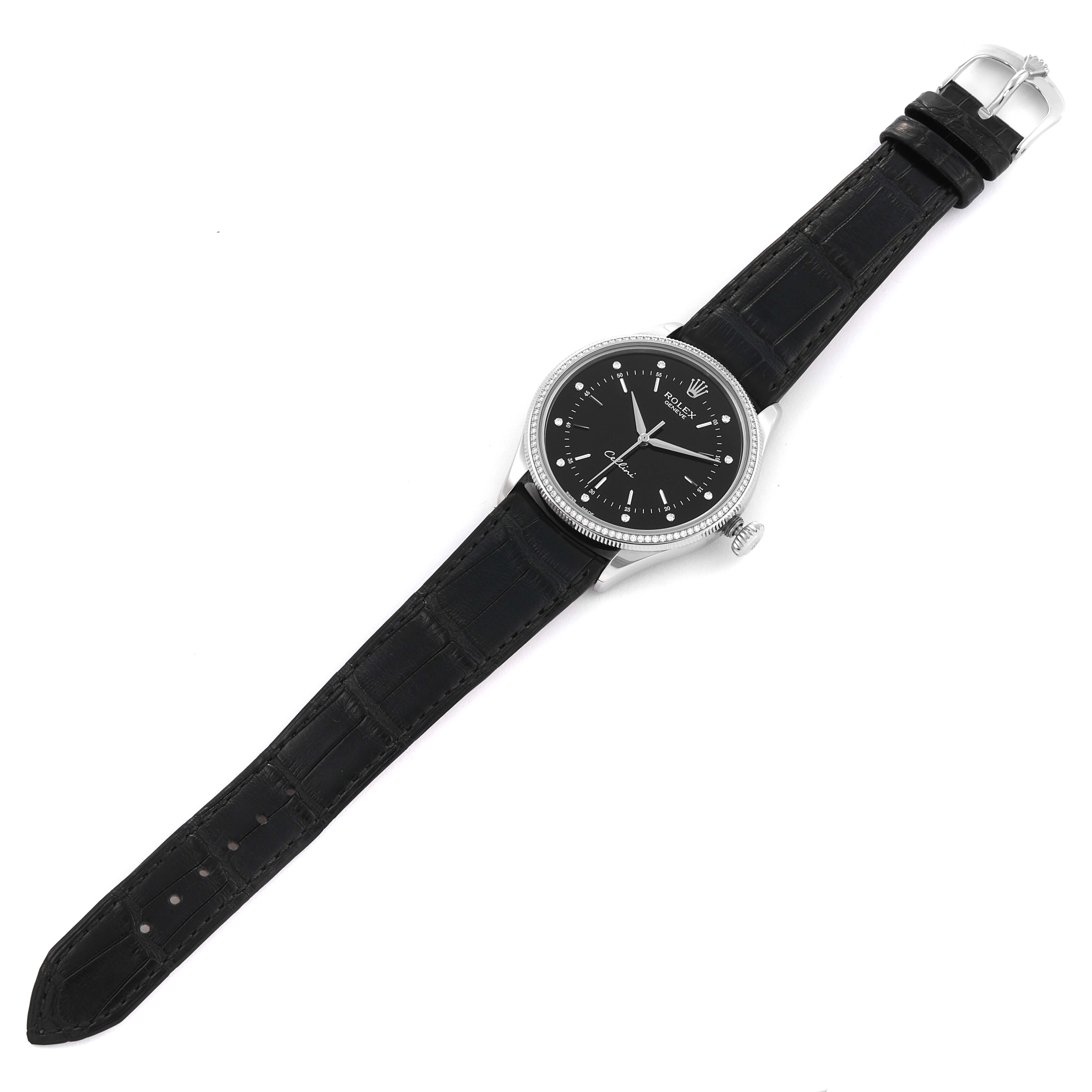 The Rolex Cellini 50609RBR Men's White Gold Black Dial 50609RBR Men's White Gold Black Dial watch is shown from a top-down angle, including the face, bezel, crown, and entire black strap with buckle.