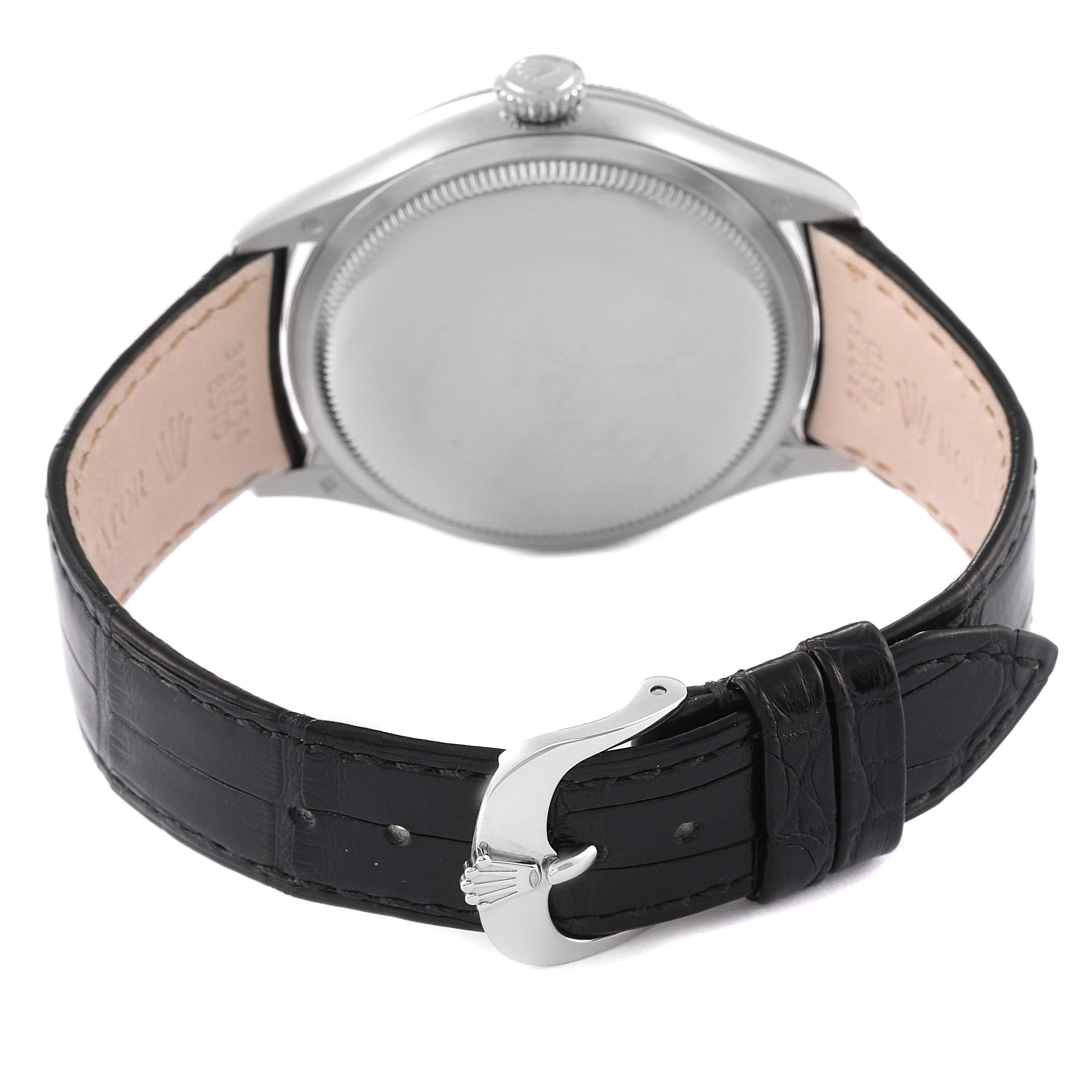 The image shows the back view of a Rolex Cellini 50609RBR Men's White Gold Black Dial 50609RBR Men's White Gold Black Dial watch, highlighting the case back and black leather strap with a clasp.