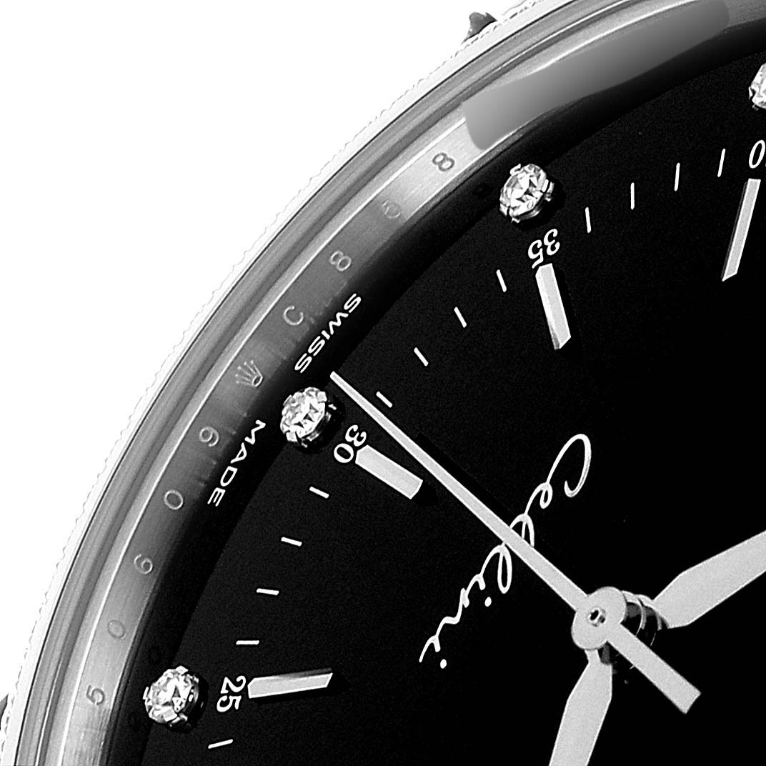 This close-up angle of the Rolex Cellini 50609RBR Men's White Gold Black Dial 50609RBR Men's White Gold Black Dial watch shows part of the dial, markers, and hands.