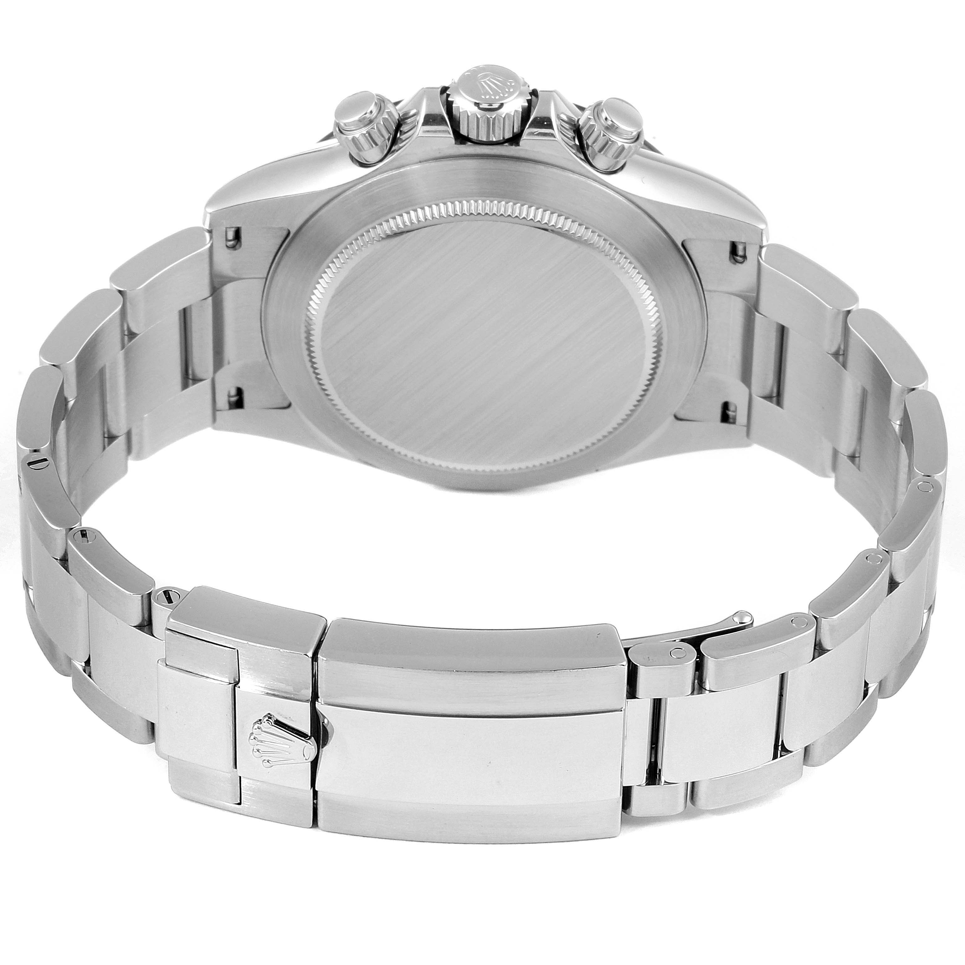 The image shows the back case, crown, pushers, and clasp of a Rolex Daytona 116500 Men
s Stainless Steel Black Dial 116500 Men
s Stainless Steel Black Dial watch from a rear angle.