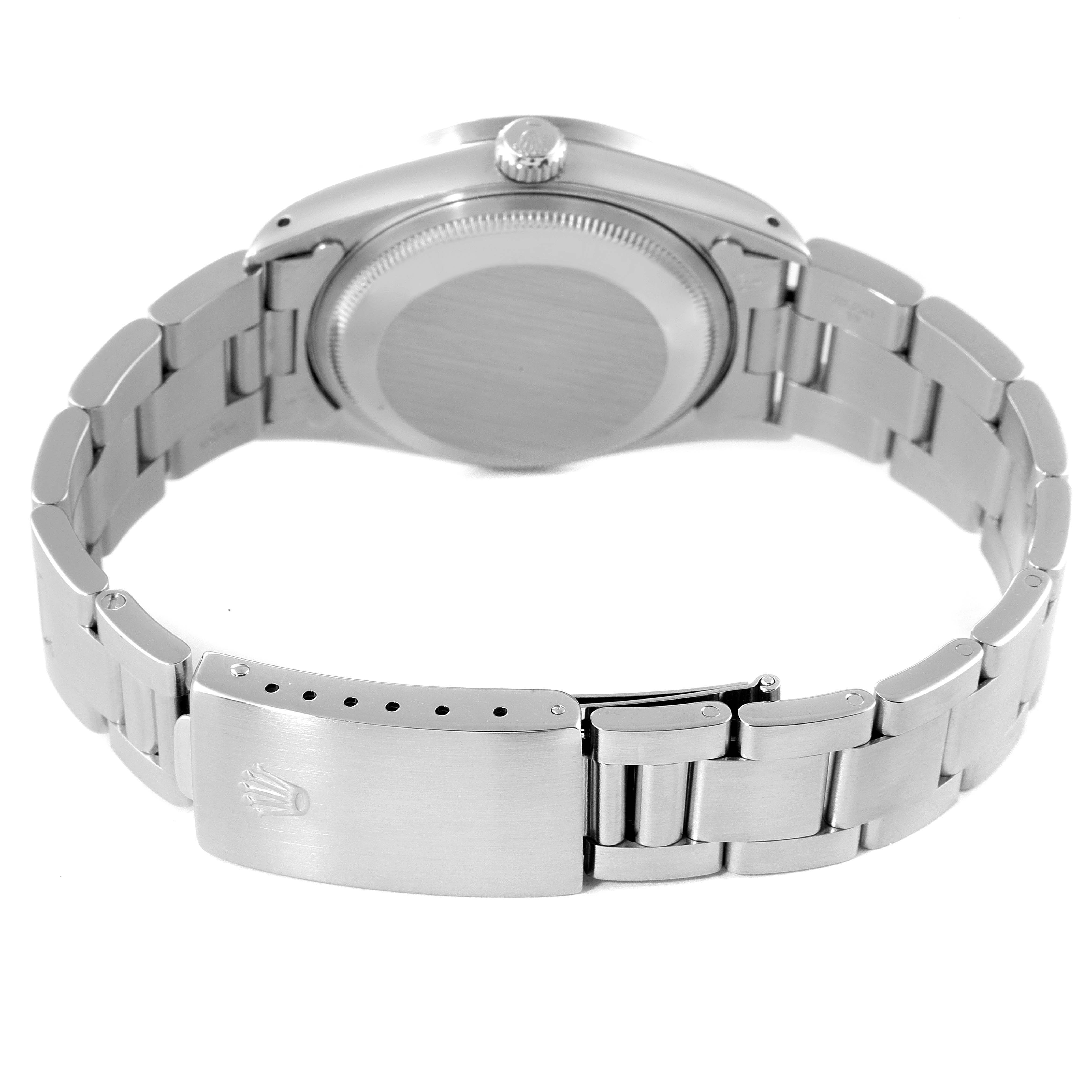 The image shows the back view of the Rolex Air-King 15210 Men's Stainless Steel Silver Dial 15210 Men's Stainless Steel Silver Dial watch highlighting the bracelet, clasp, and case back.