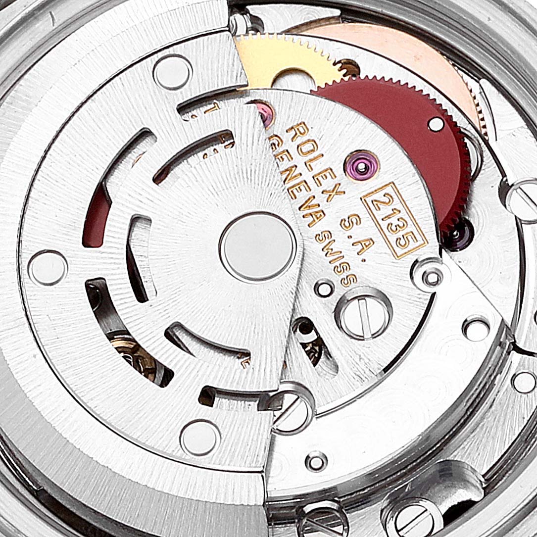The image shows an angled close-up of the internal mechanism of a Rolex Datejust 69173 Women's Steel and Gold (two tone) Black Dial 69173 Women's Steel and Gold (two tone) Black Dial watch, featuring the movement components.