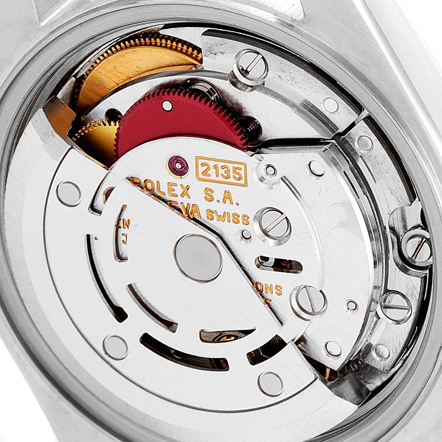 This image shows the internal mechanism of a Rolex Datejust 69173 Women
s Steel and Gold (two tone) Champagne Dial 69173 Women
s Steel and Gold (two tone) Champagne Dial watch from the back, displaying the calibers and gears.