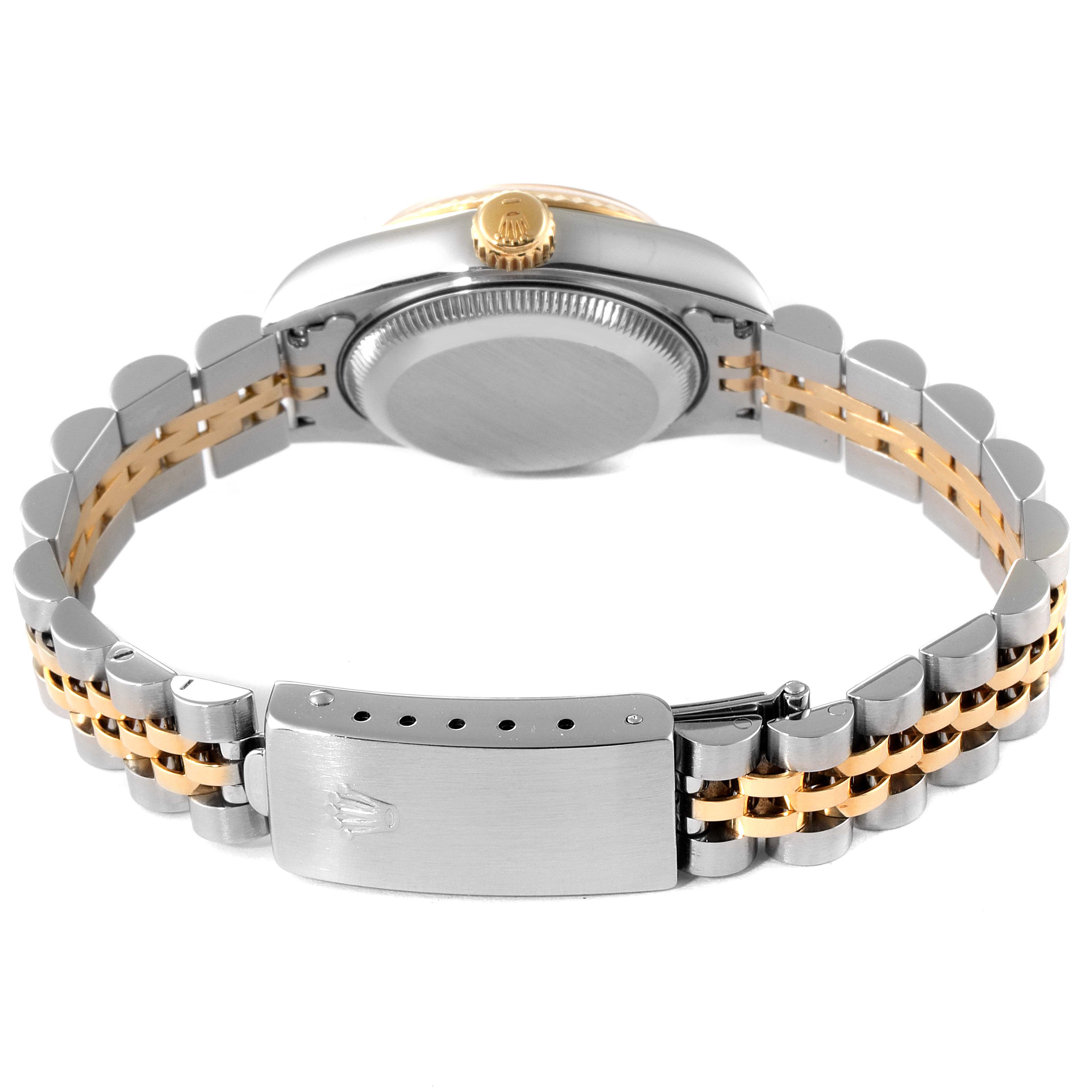 This image shows the back view of a Rolex Datejust 69173 Women
s Steel and Gold (two tone) Champagne Dial 69173 Women
s Steel and Gold (two tone) Champagne Dial watch, highlighting the case, crown, and two-tone bracelet.
