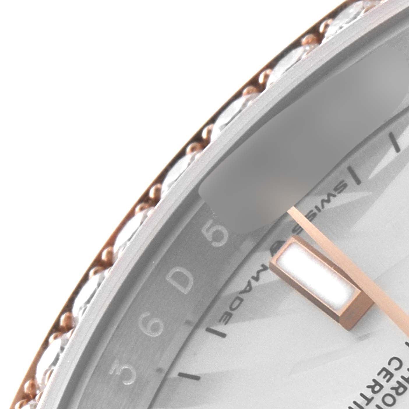 This close-up image shows the dial and part of the bezel of a Rolex Datejust 126281 Men's Steel and Gold (two tone) Silver Dial 126281 Men's Steel and Gold (two tone) Silver Dial watch.