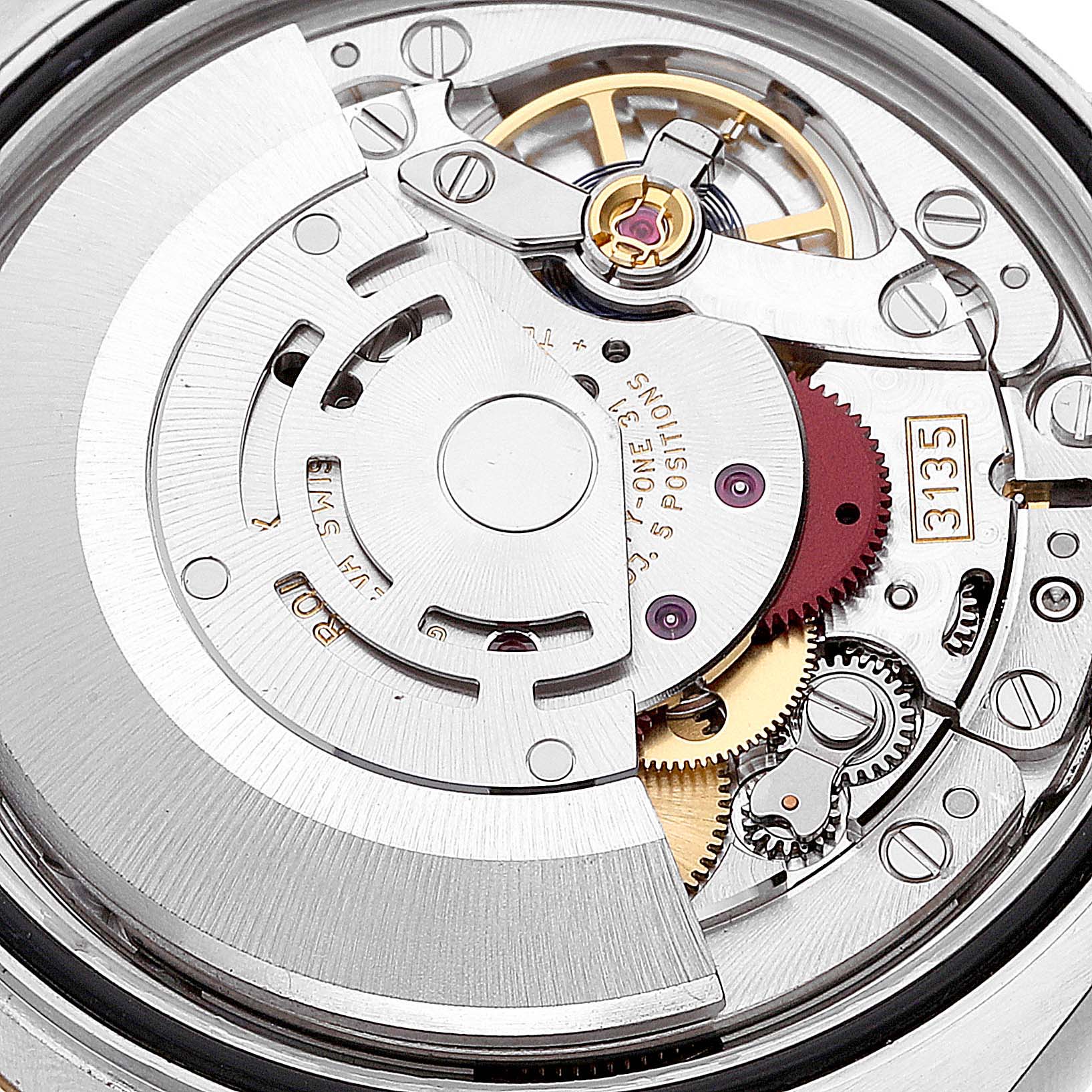 The image shows the internal mechanical movement of a Rolex Datejust 116233 Men's Steel and Gold (two tone) Champagne Dial 116233 Men's Steel and Gold (two tone) Champagne Dial watch, taken from a close-up rear angle.