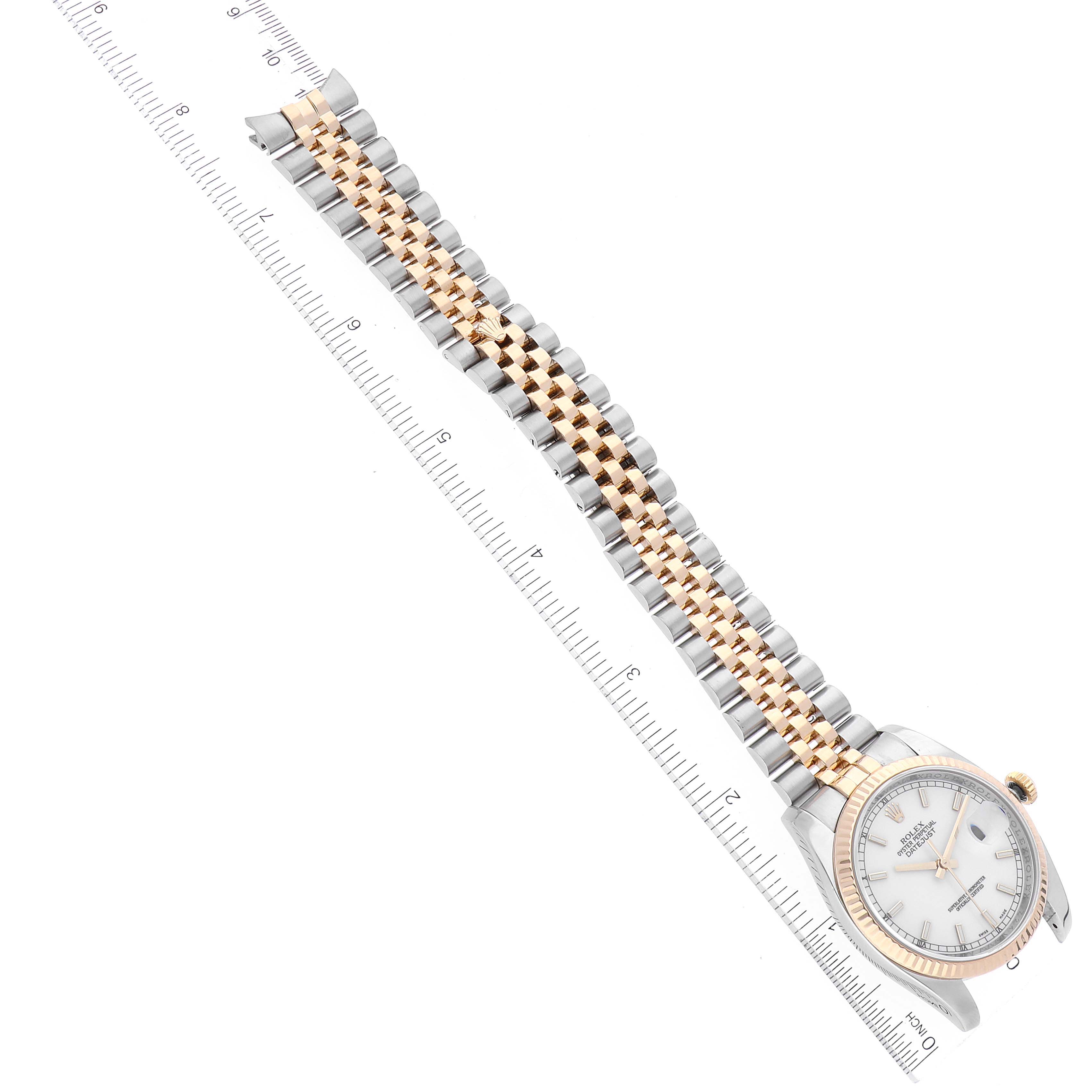 The image shows a top-down angle of a Rolex Datejust 116233 Men's Steel and Gold (two tone) White Dial 116233 Men's Steel and Gold (two tone) White Dial watch, highlighting its two-tone bracelet and face.