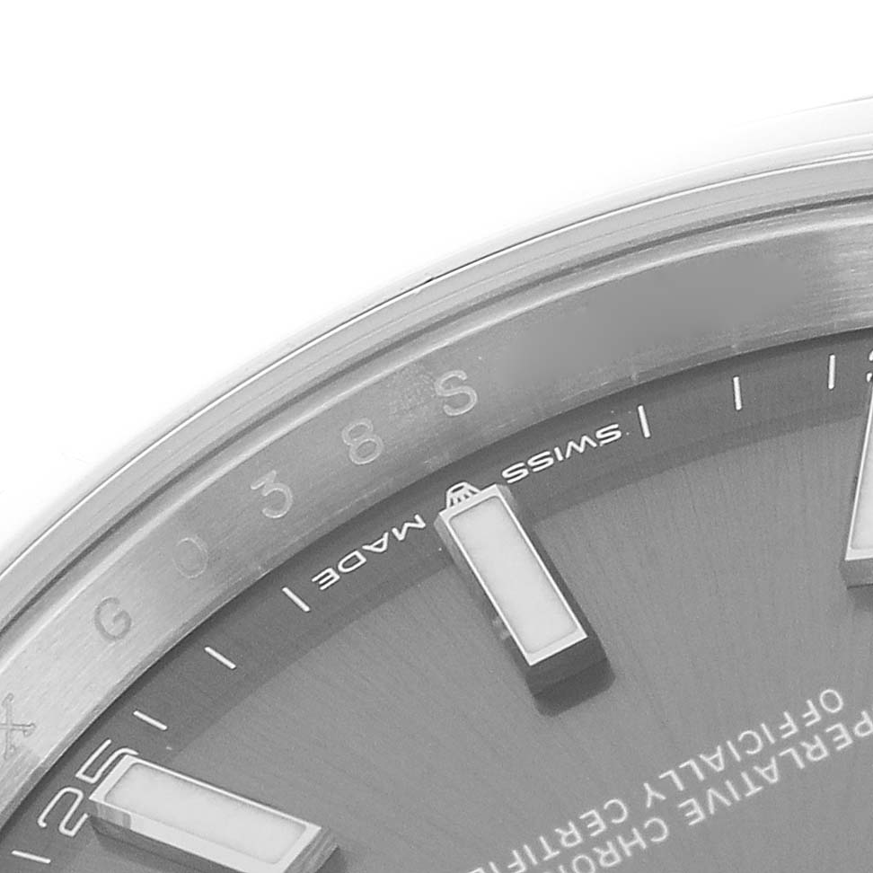 This image shows a close-up of the dial and part of the rehaut of a Rolex Datejust 41 126300 Men
s Stainless Steel Grey Dial 126300 Men
s Stainless Steel Grey Dial watch, displaying its "Swiss Made" label and markers.