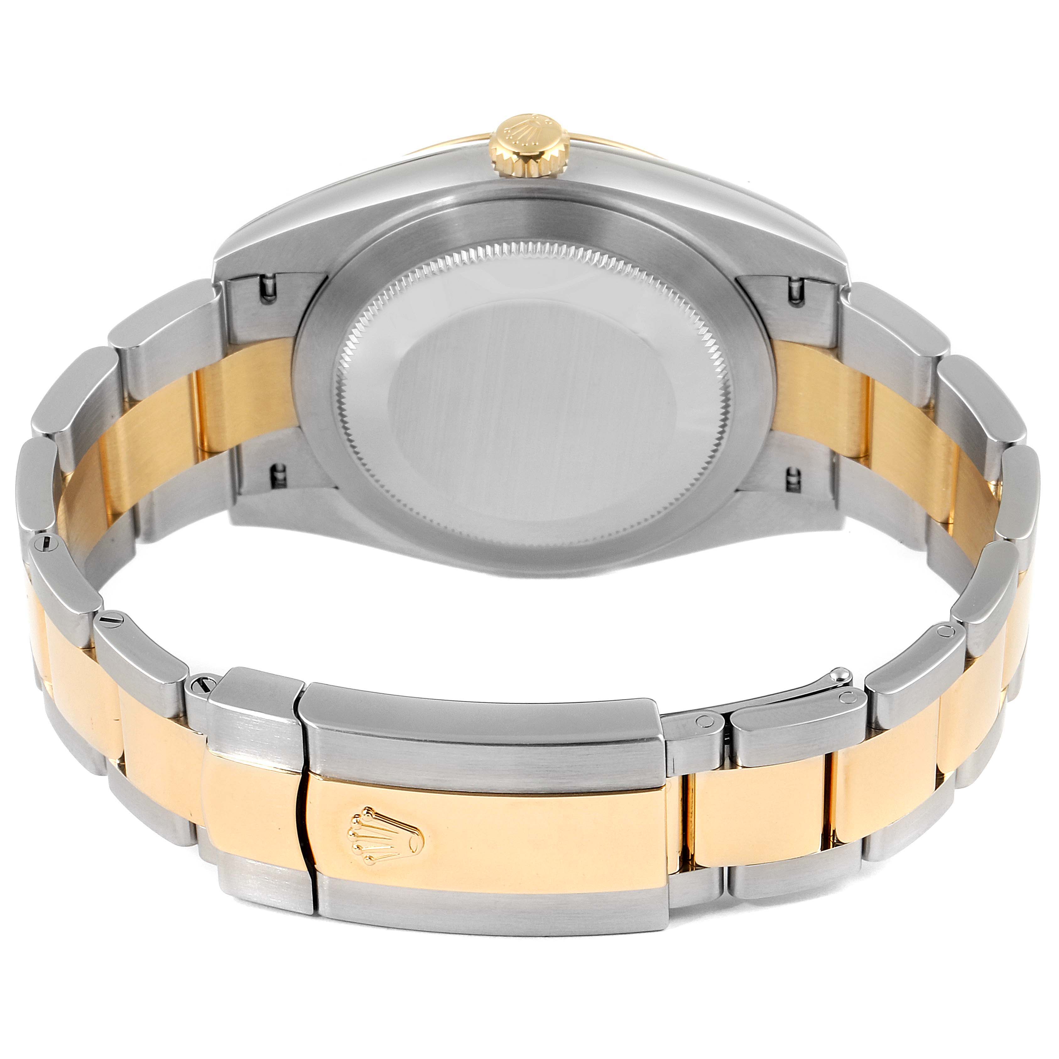 The image shows the back case and bracelet of a Rolex Datejust 41 126303 Men's Steel and Gold (two tone) Black Dial 126303 Men's Steel and Gold (two tone) Black Dial watch from a rear angle.