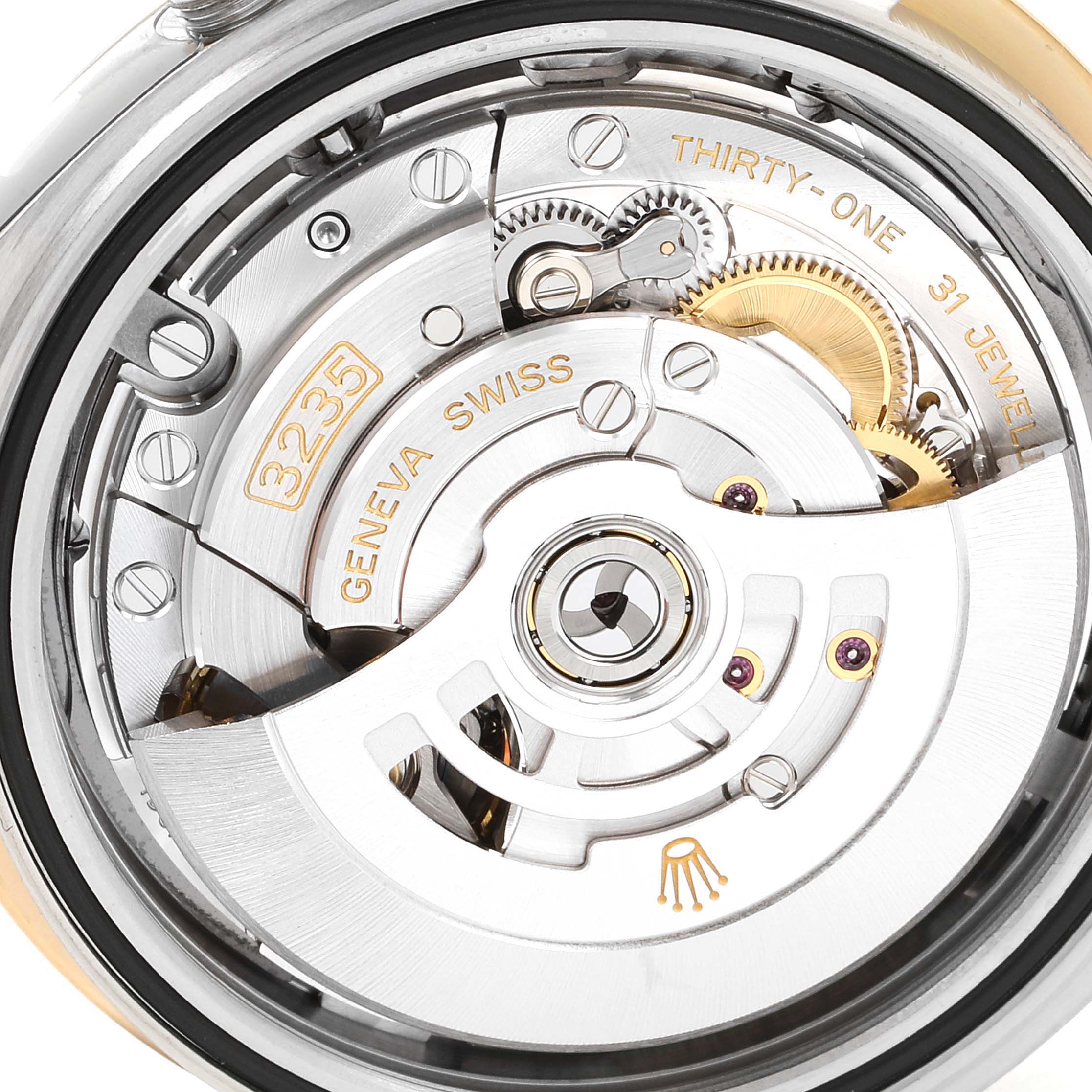 The image shows the internal mechanism and rotor of the Rolex Datejust 41 126303 Men's Steel and Gold (two tone) Grey Dial 126303 Men's Steel and Gold (two tone) Grey Dial watch from an angled, close-up perspective.
