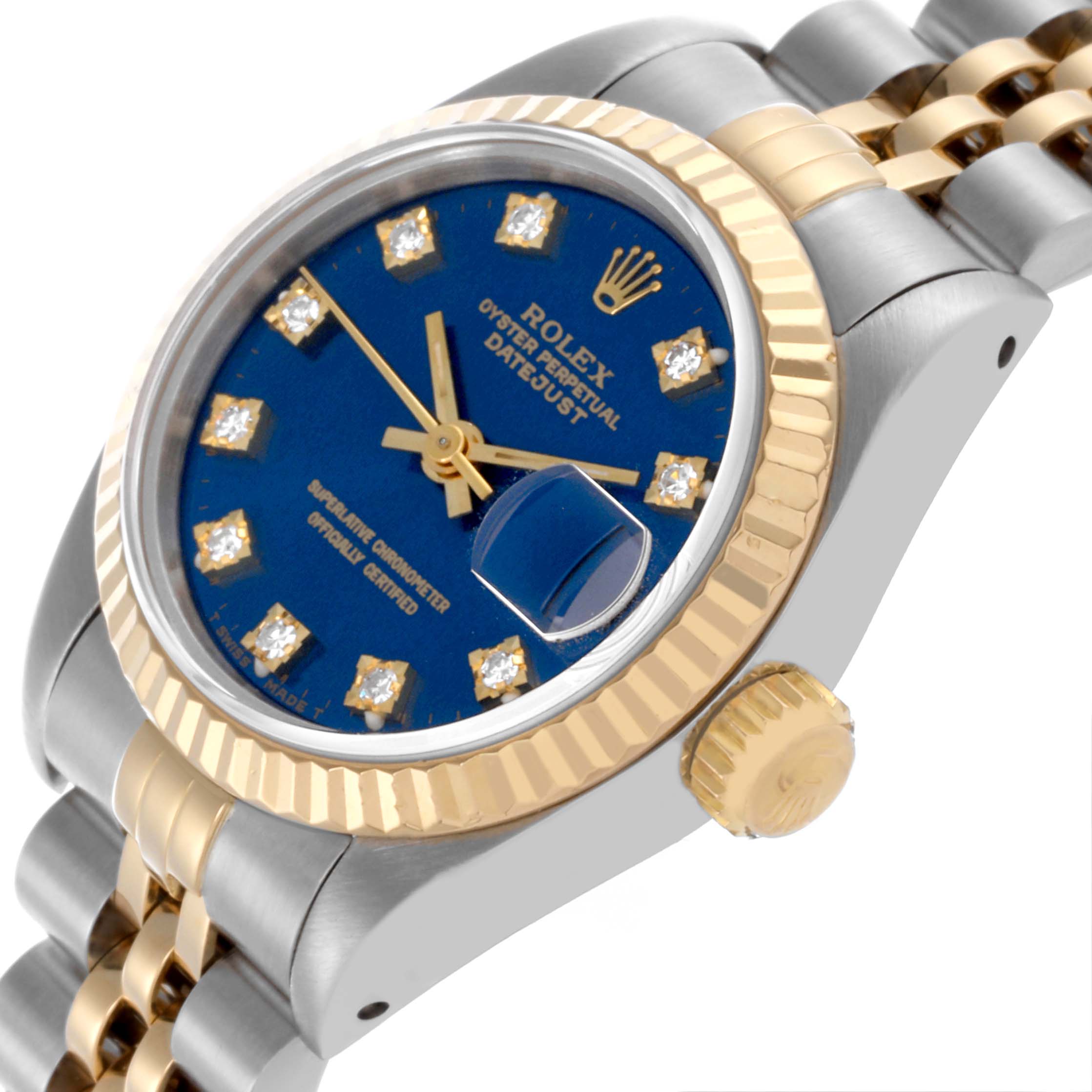 The Rolex Datejust 69173 Women's Steel and Gold (two tone) Blue Dial 69173 Women's Steel and Gold (two tone) Blue Dial watch is shown at an angle displaying the blue dial, fluted bezel, crown, and part of the two-tone bracelet.