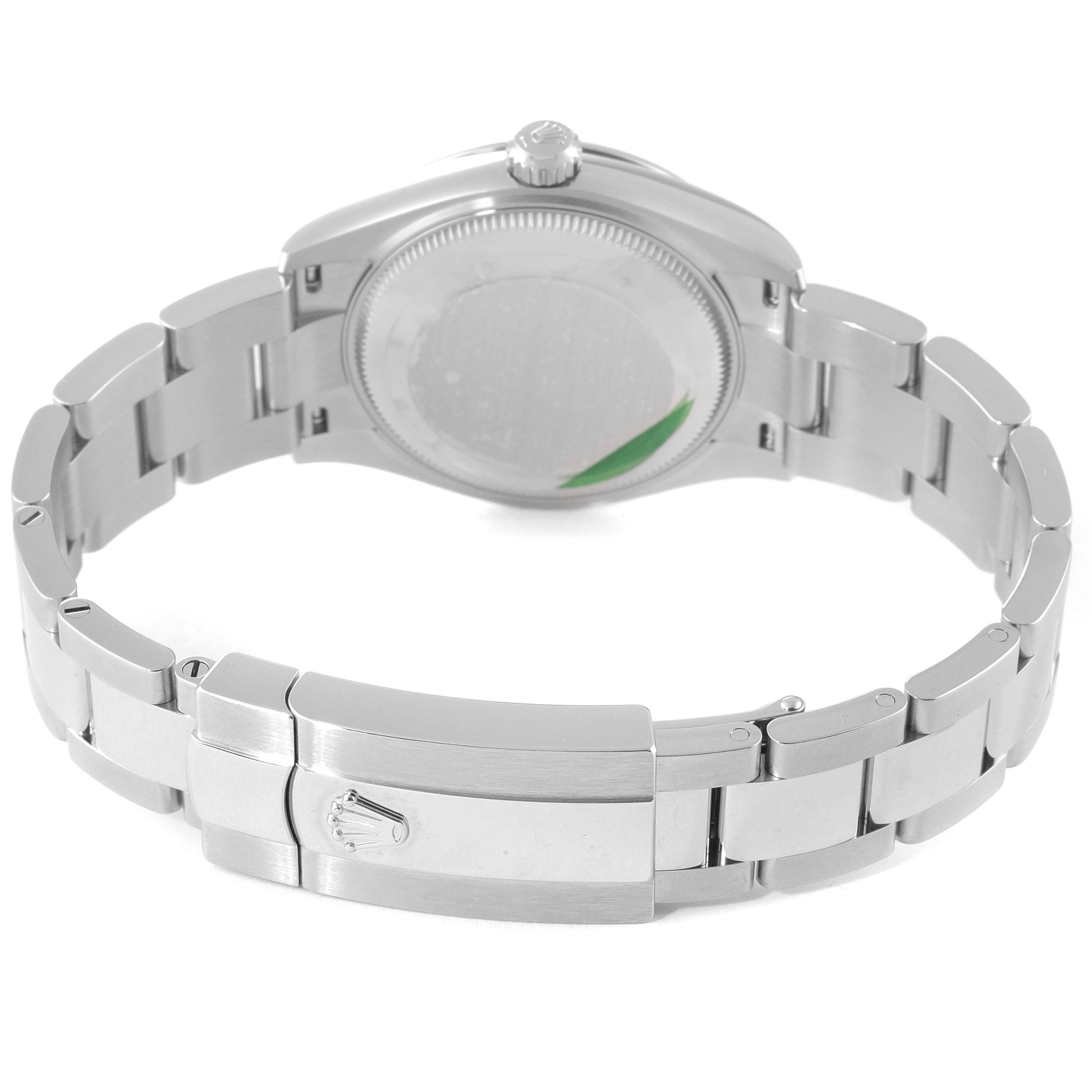The image shows the back and bracelet of a mid-size Rolex watch, highlighting the clasp and case back.