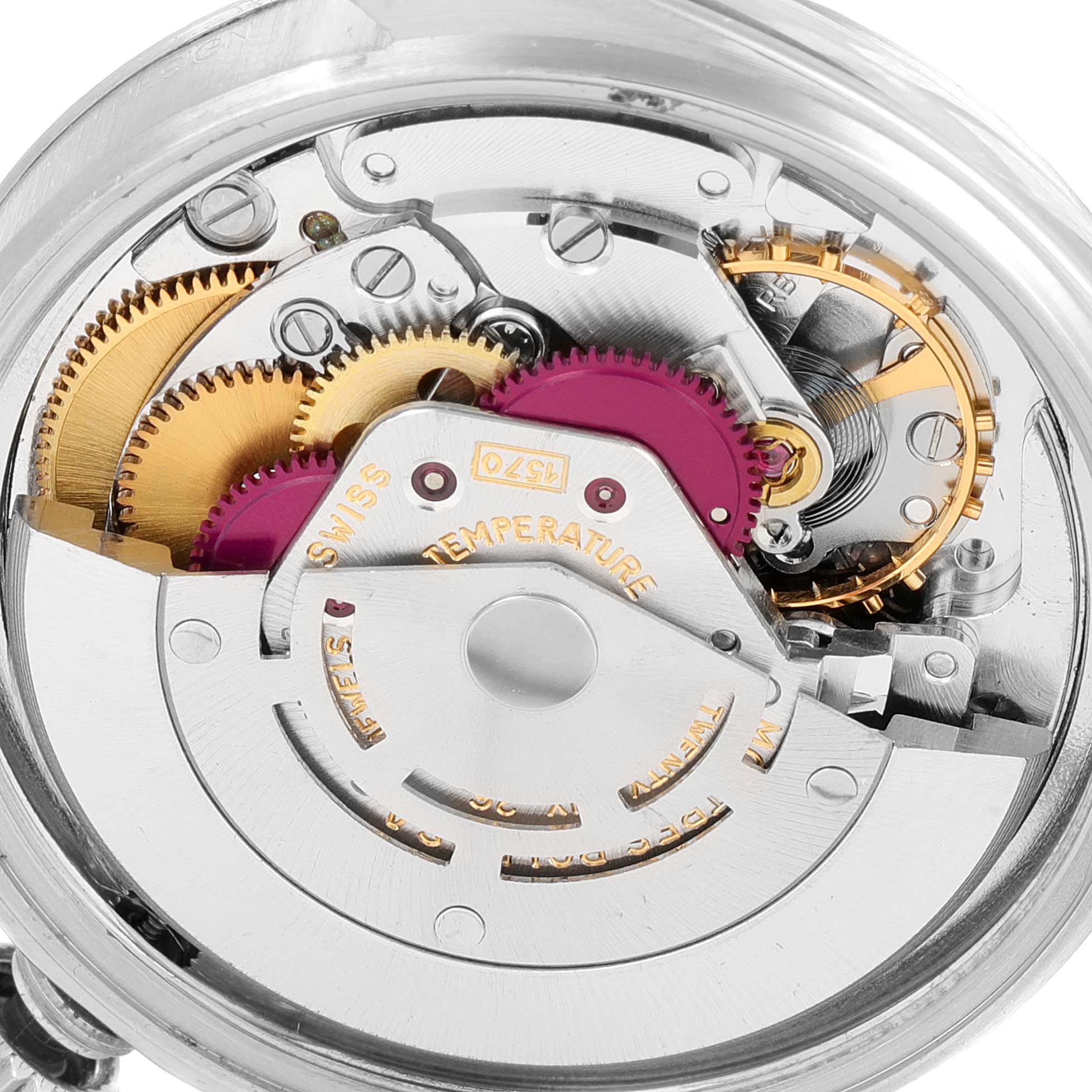 This image shows a close-up of the Rolex Datejust 1603 Men
s Stainless Steel Silver Dial 1603 Men
s Stainless Steel Silver Dial
s mechanical movement components from the rear.