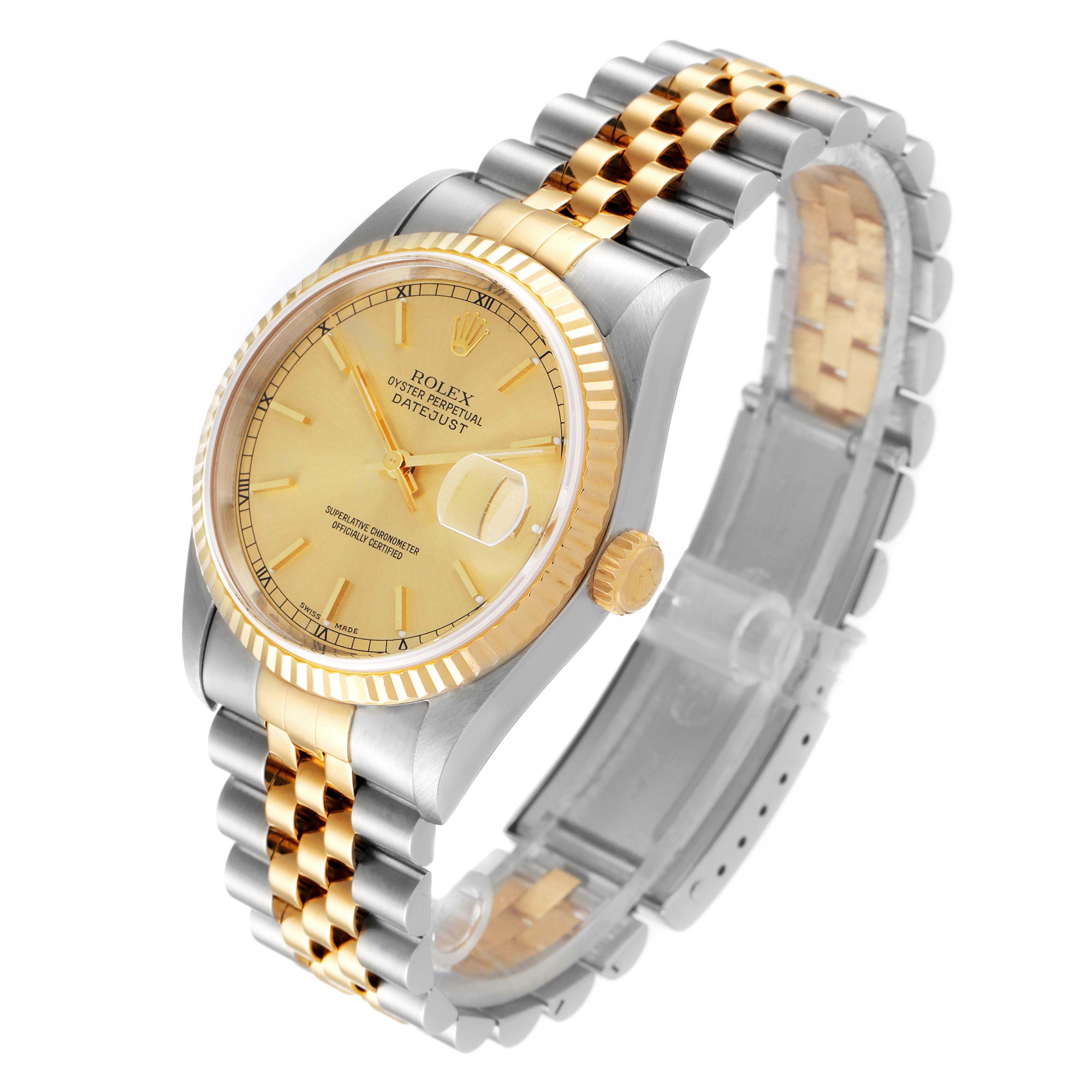 The image shows a Rolex Datejust 16233 Men's Steel and Gold (two tone) Champagne Dial 16233 Men's Steel and Gold (two tone) Champagne Dial watch with a gold dial, bezel, and two-tone metal bracelet from a high-angle view.