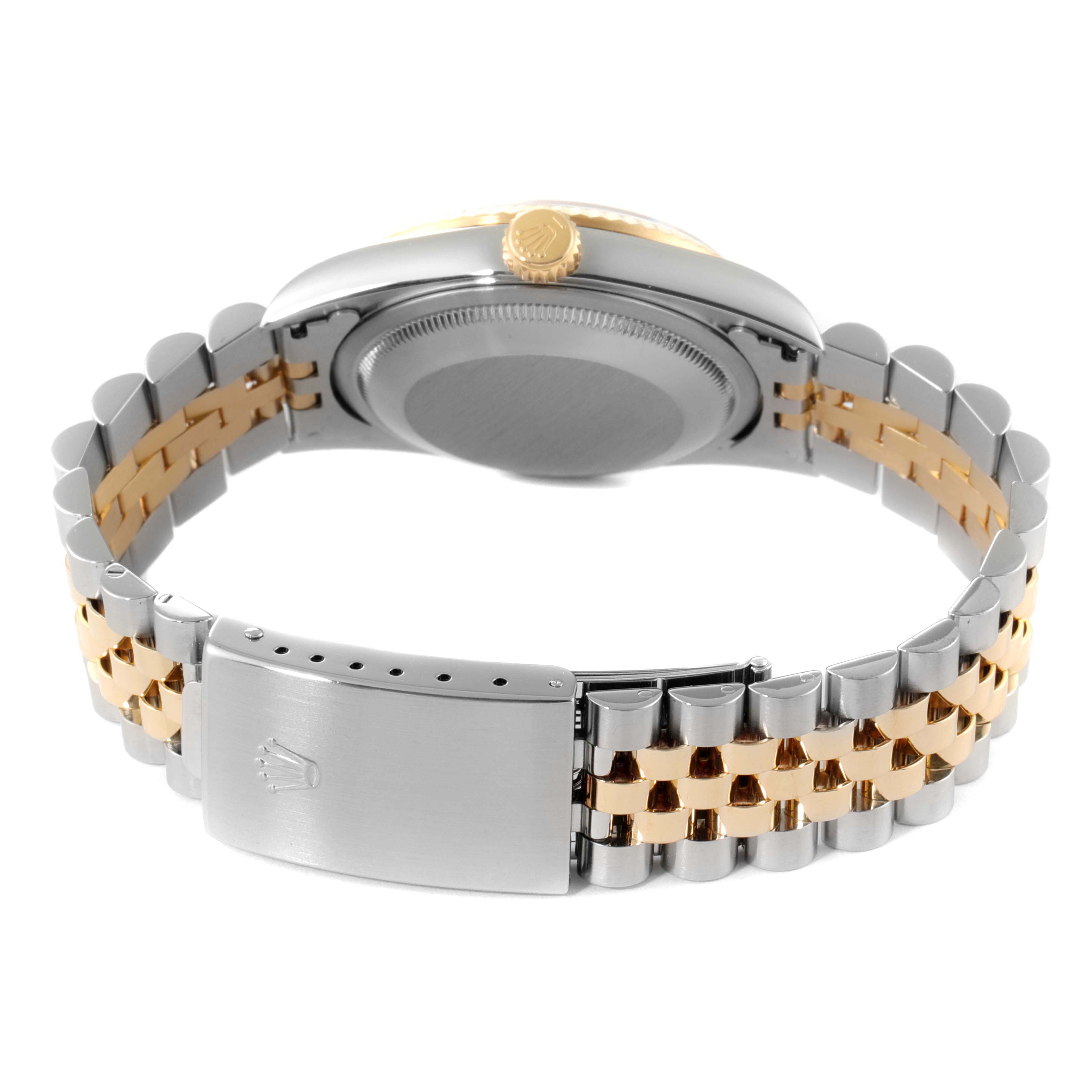 The image shows the back view of a Rolex Datejust 16233 Men's Steel and Gold (two tone) Champagne Dial 16233 Men's Steel and Gold (two tone) Champagne Dial watch, highlighting the case back and the clasp of its two-tone bracelet.