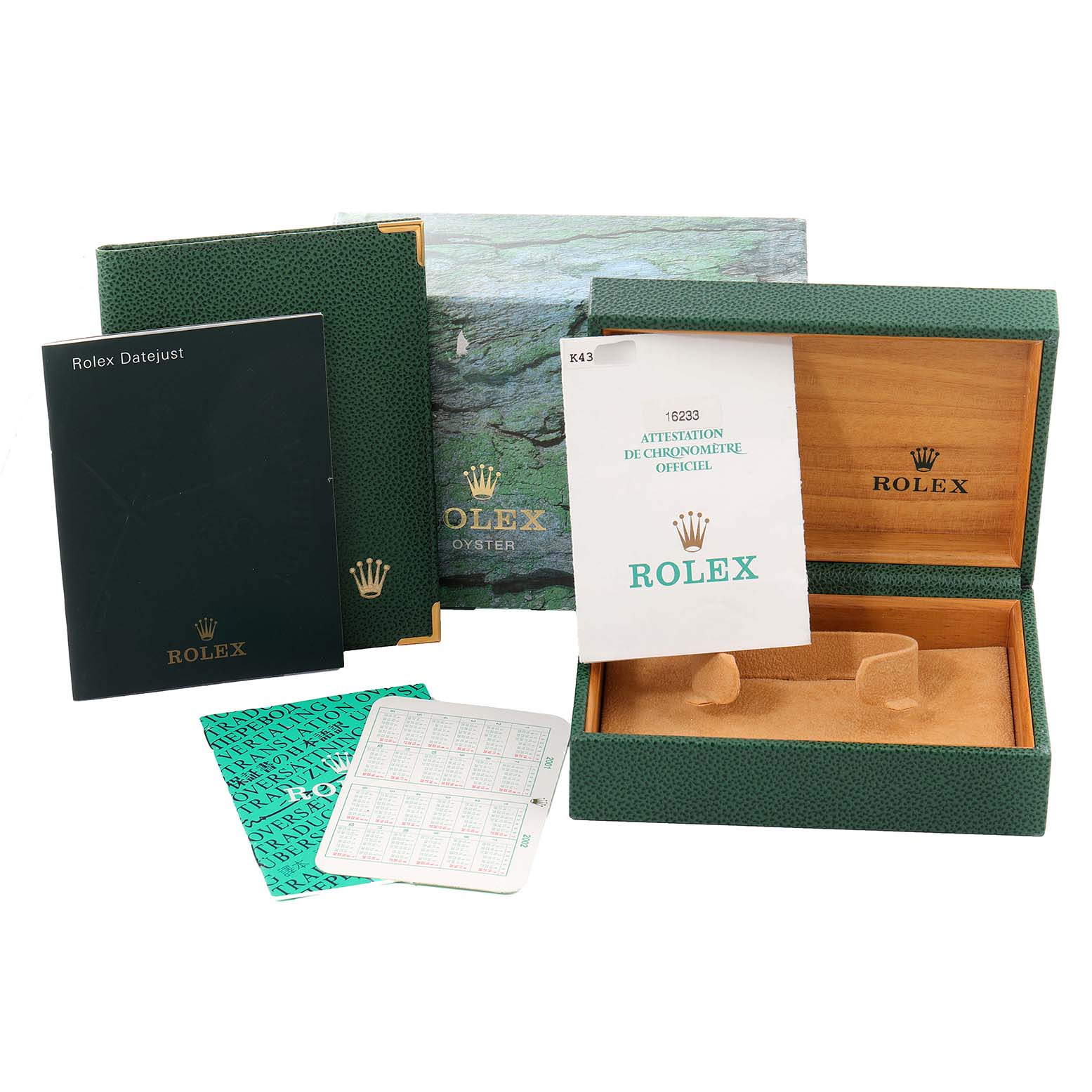 The image shows the packaging contents of a Rolex Datejust 16233 Men's Steel and Gold (two tone) Blue Dial 16233 Men's Steel and Gold (two tone) Blue Dial, including the box, manuals, warranty card, and certification.