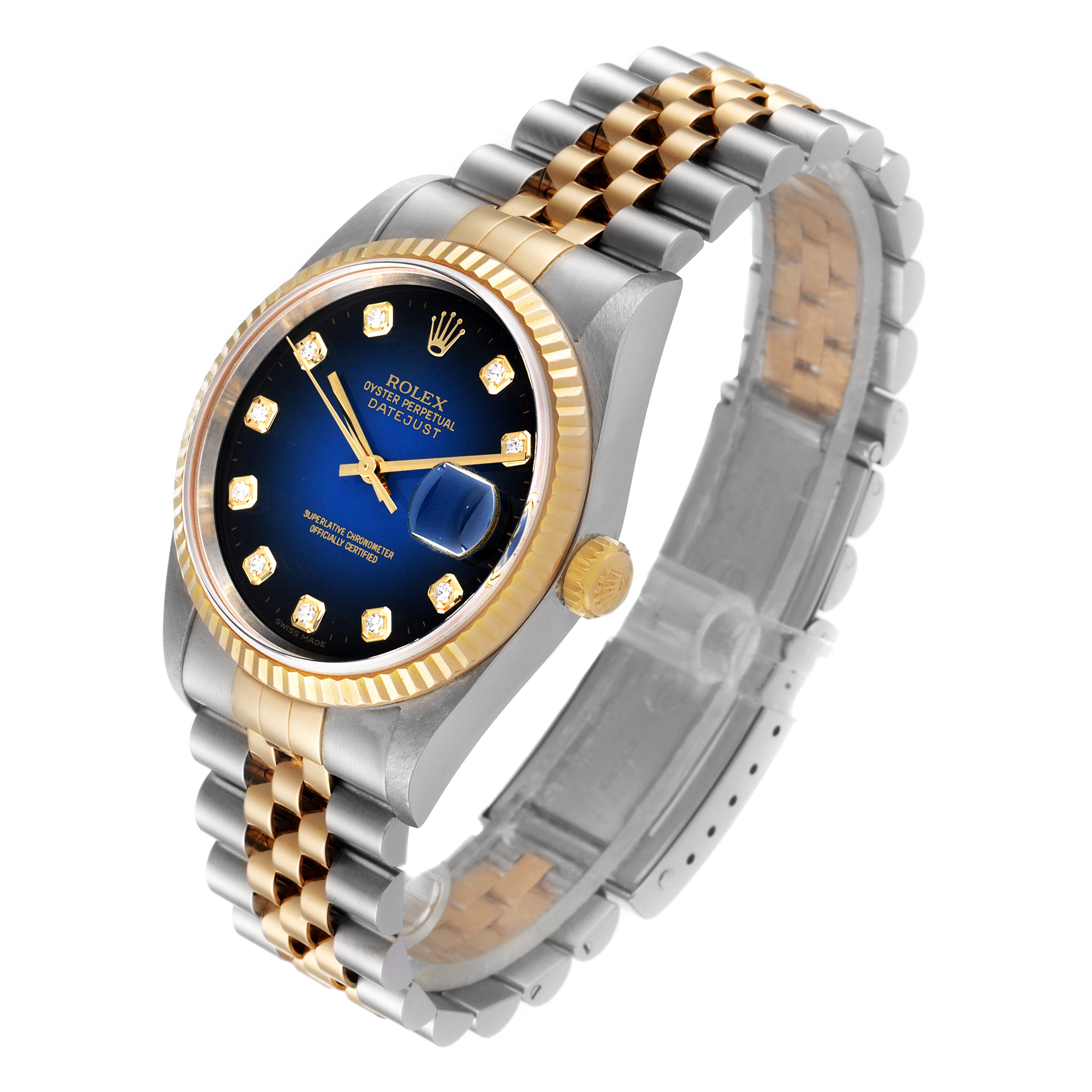 The Rolex Datejust 16233 Men's Steel and Gold (two tone) Blue Dial 16233 Men's Steel and Gold (two tone) Blue Dial watch is shown at an angled view displaying its face, bezel, crown, and two-tone bracelet.
