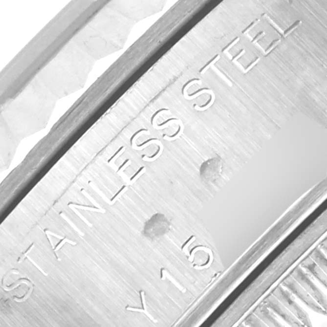 The image shows a close-up of the stainless steel marking on the side of a Rolex Datejust 79174 Women's Stainless Steel White Dial 79174 Women's Stainless Steel White Dial watch case.