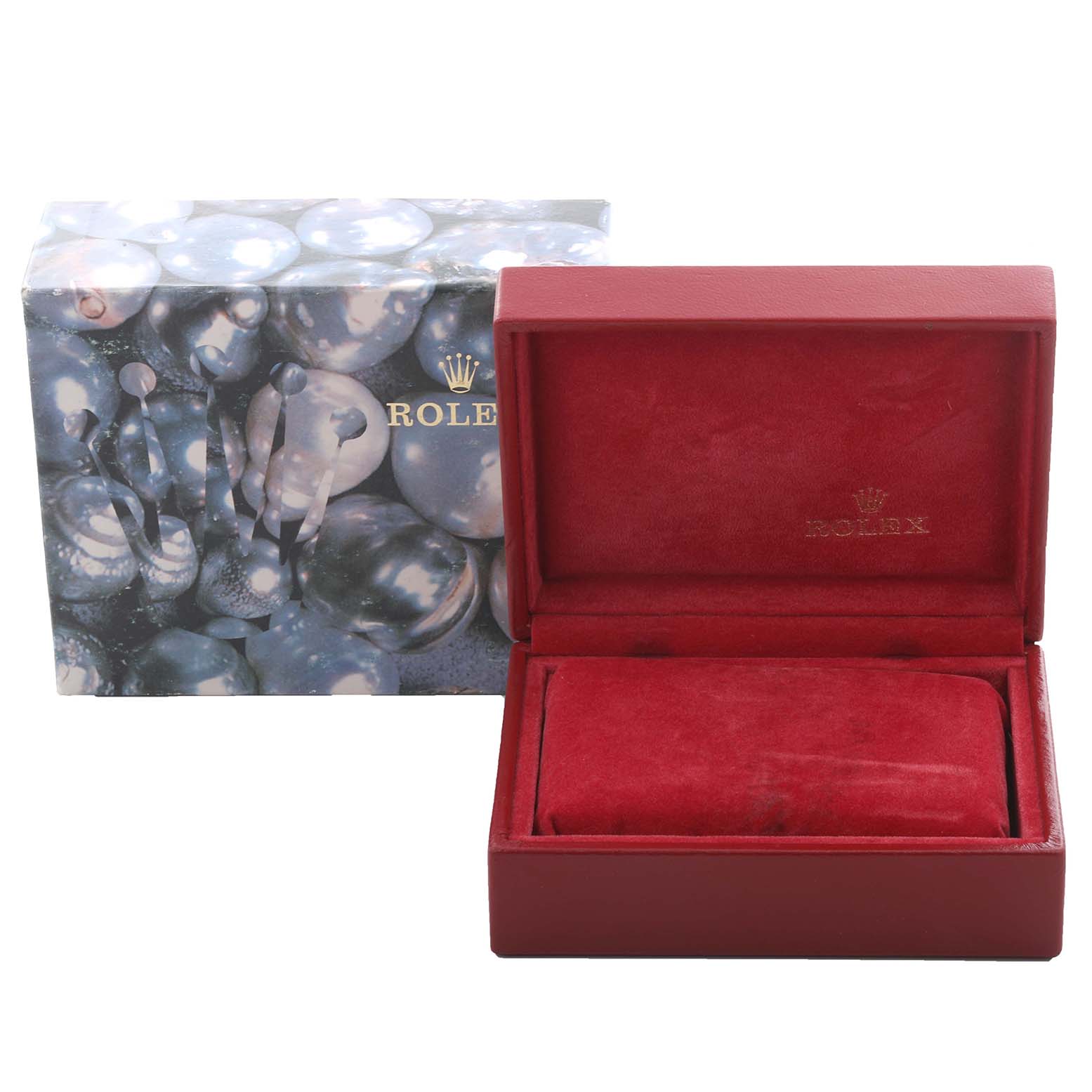 The image shows a closed Rolex Datejust 79174 Women's Stainless Steel White Dial 79174 Women's Stainless Steel White Dial box with a red interior and a cardboard outer box beside it.