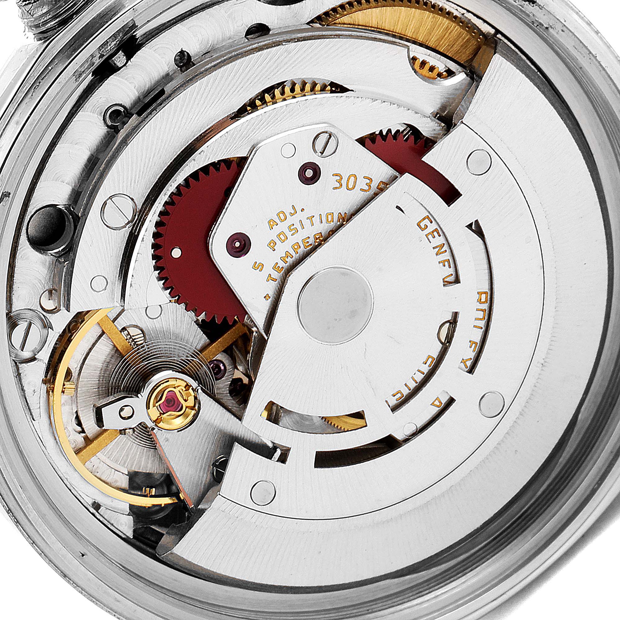 This image shows the intricate movement and inner mechanism of a Rolex Vintage Collection 16014 Men's Stainless Steel Silver Dial 16014 Men's Stainless Steel Silver Dial watch viewed from the back.
