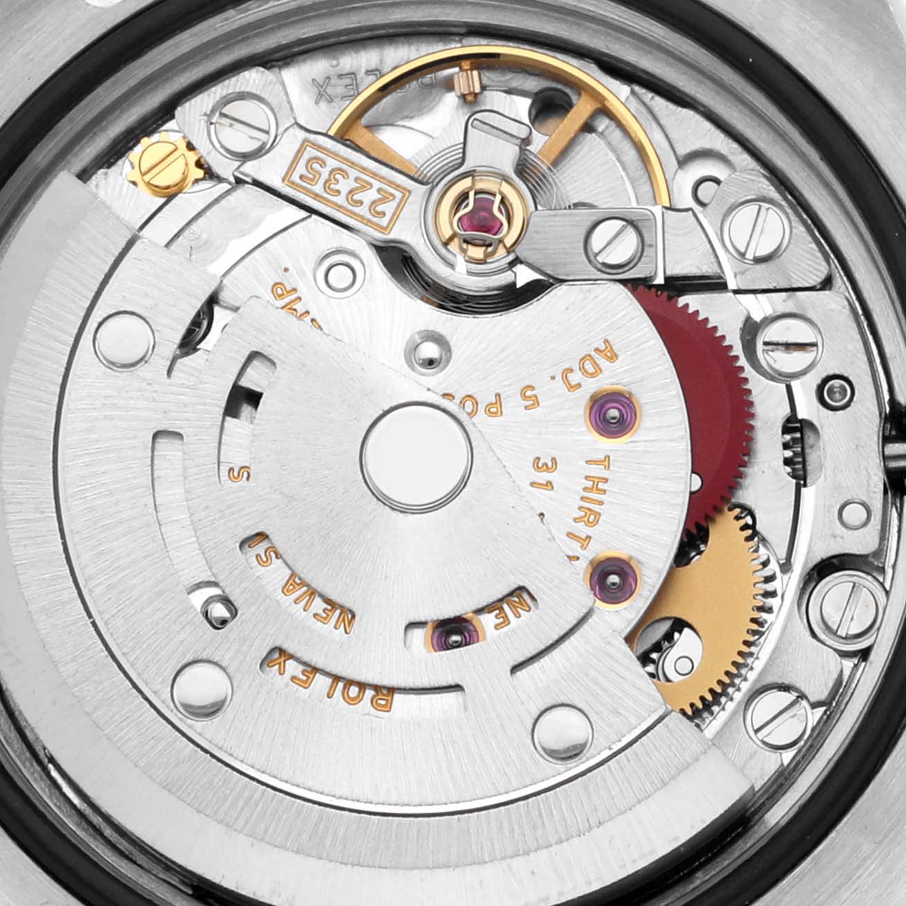 The image shows the intricate movement mechanism of a Rolex Datejust 179174 Women's Stainless Steel Silver Dial 179174 Women's Stainless Steel Silver Dial, displaying gears, rotor, and internal components in close-up.