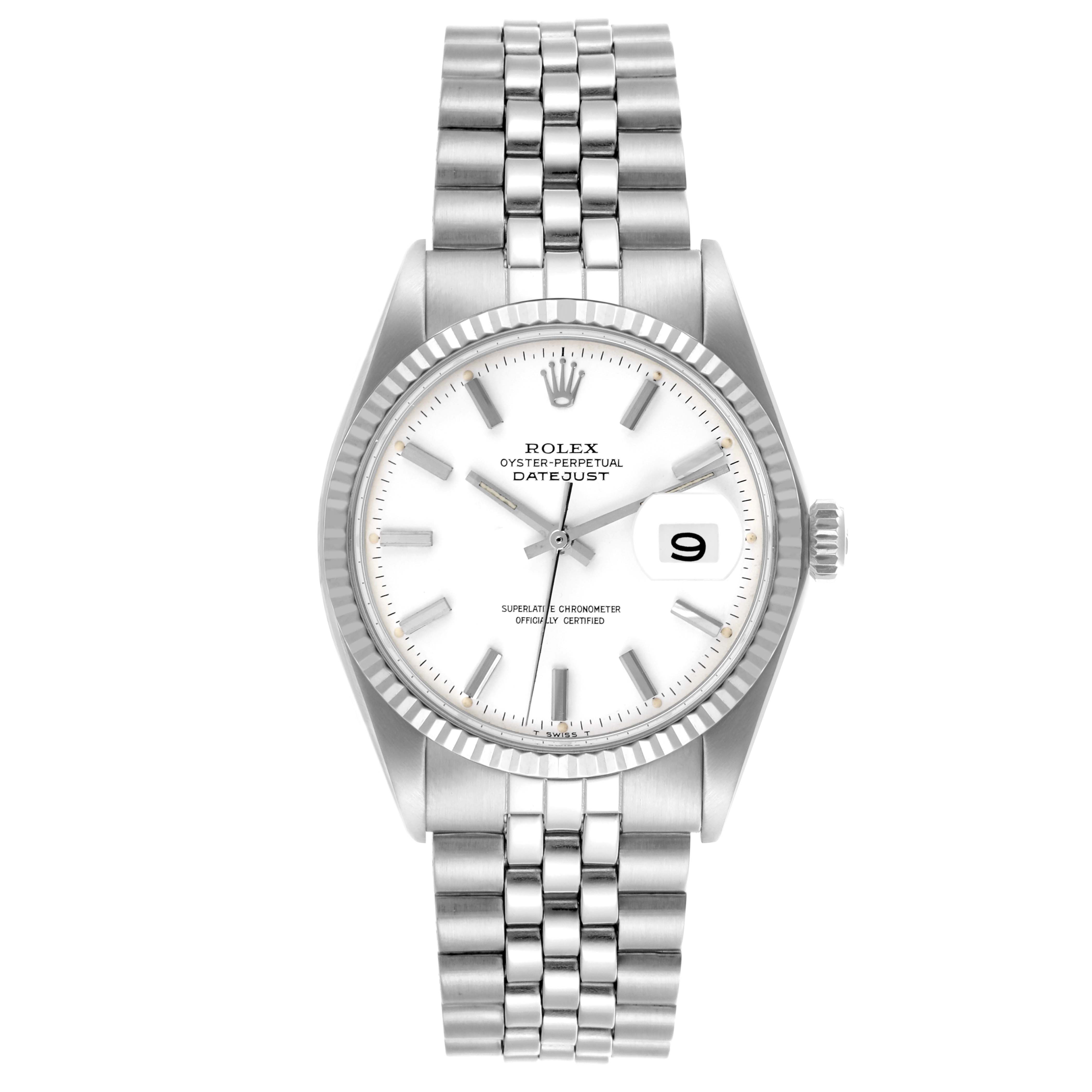 The image shows a Rolex Datejust 1601 Men
s Stainless Steel White Dial 1601 Men
s Stainless Steel White Dial watch from a top view, displaying the dial, bezel, bracelet, and crown.