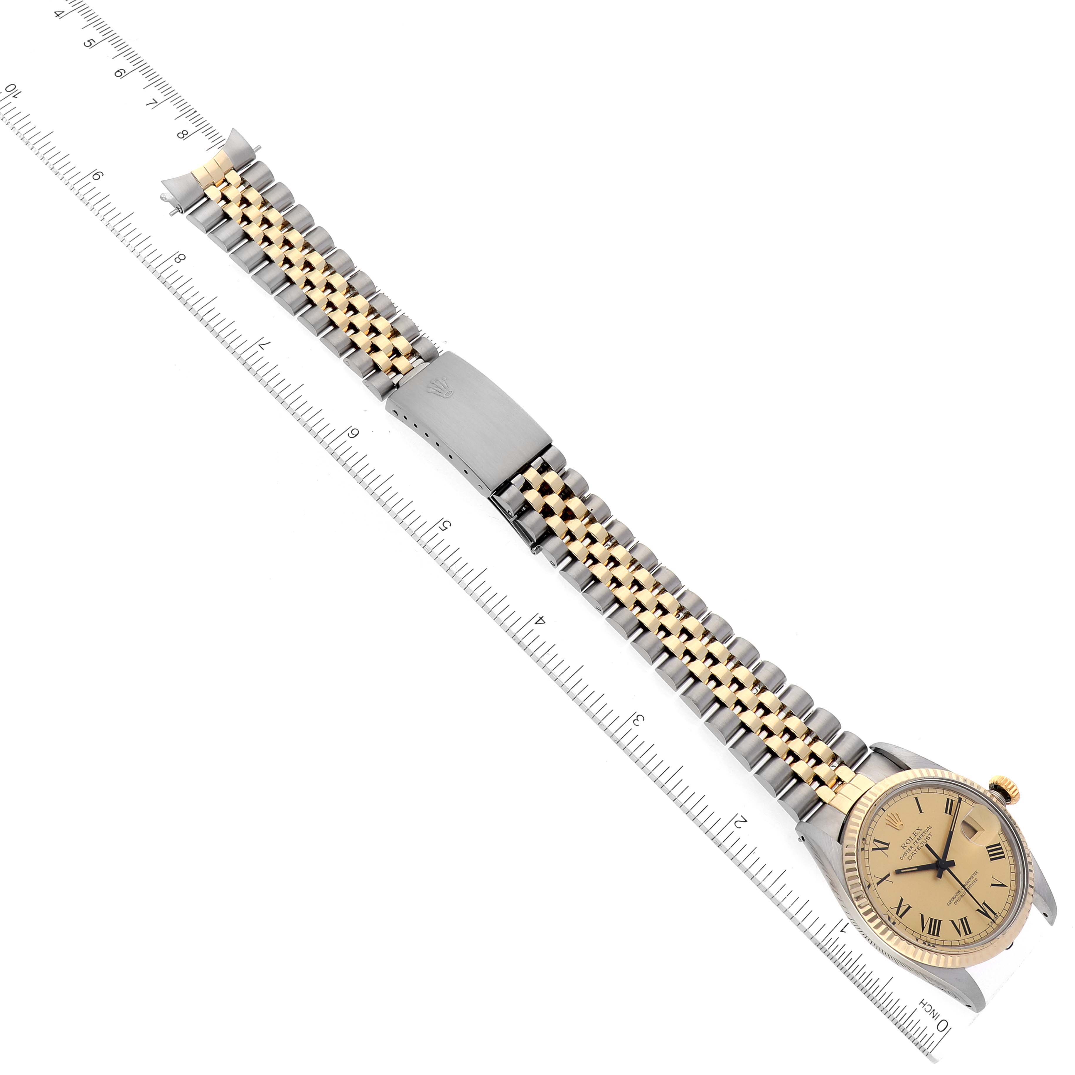 The image shows a top-down view of a Rolex Vintage Collection 16013 Men's Steel and Gold (two tone) Champagne Dial 16013 Men's Steel and Gold (two tone) Champagne Dial watch, showcasing the watch face and entire two-tone metal band.