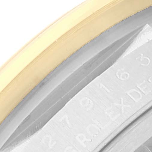 This close-up image shows part of the bezel and casing of a Rolex Datejust 279163 Women's Steel and Gold (two tone) Green Dial 279163 Women's Steel and Gold (two tone) Green Dial watch.