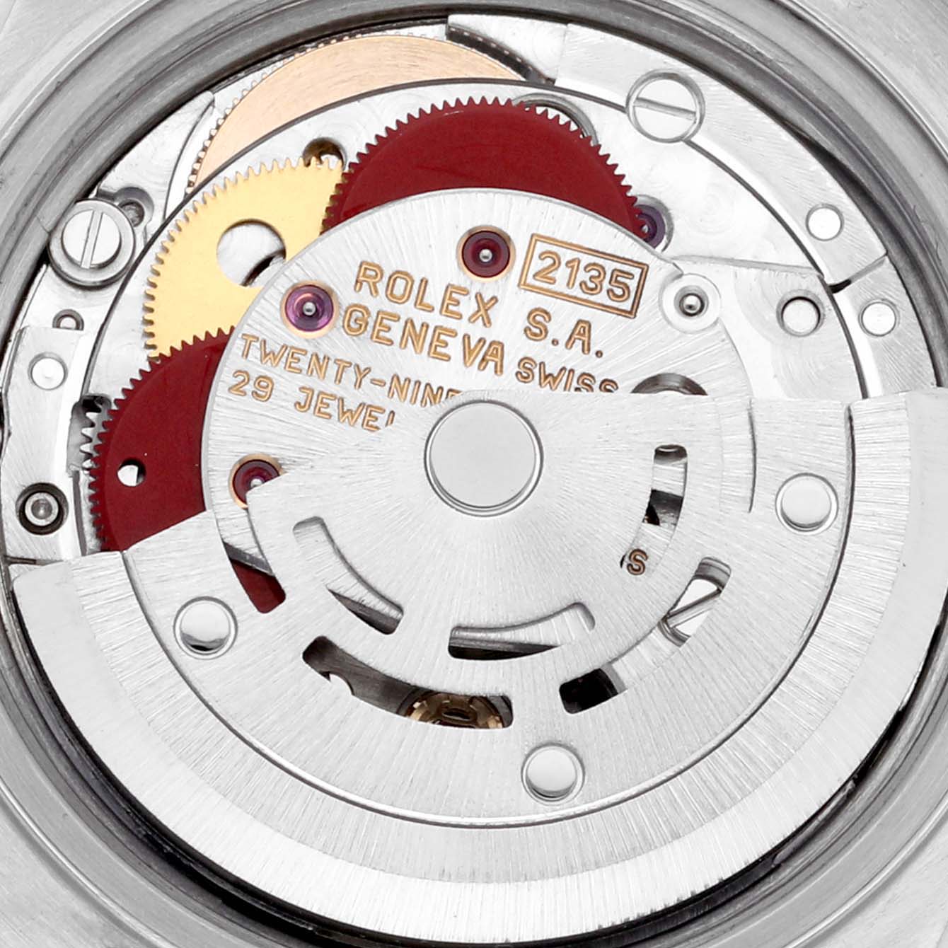 The image shows an overhead view of the movement mechanism of a Rolex Datejust 69173 Women's Steel and Gold (two tone) Champagne Dial 69173 Women's Steel and Gold (two tone) Champagne Dial watch, highlighting gears and the rotor.