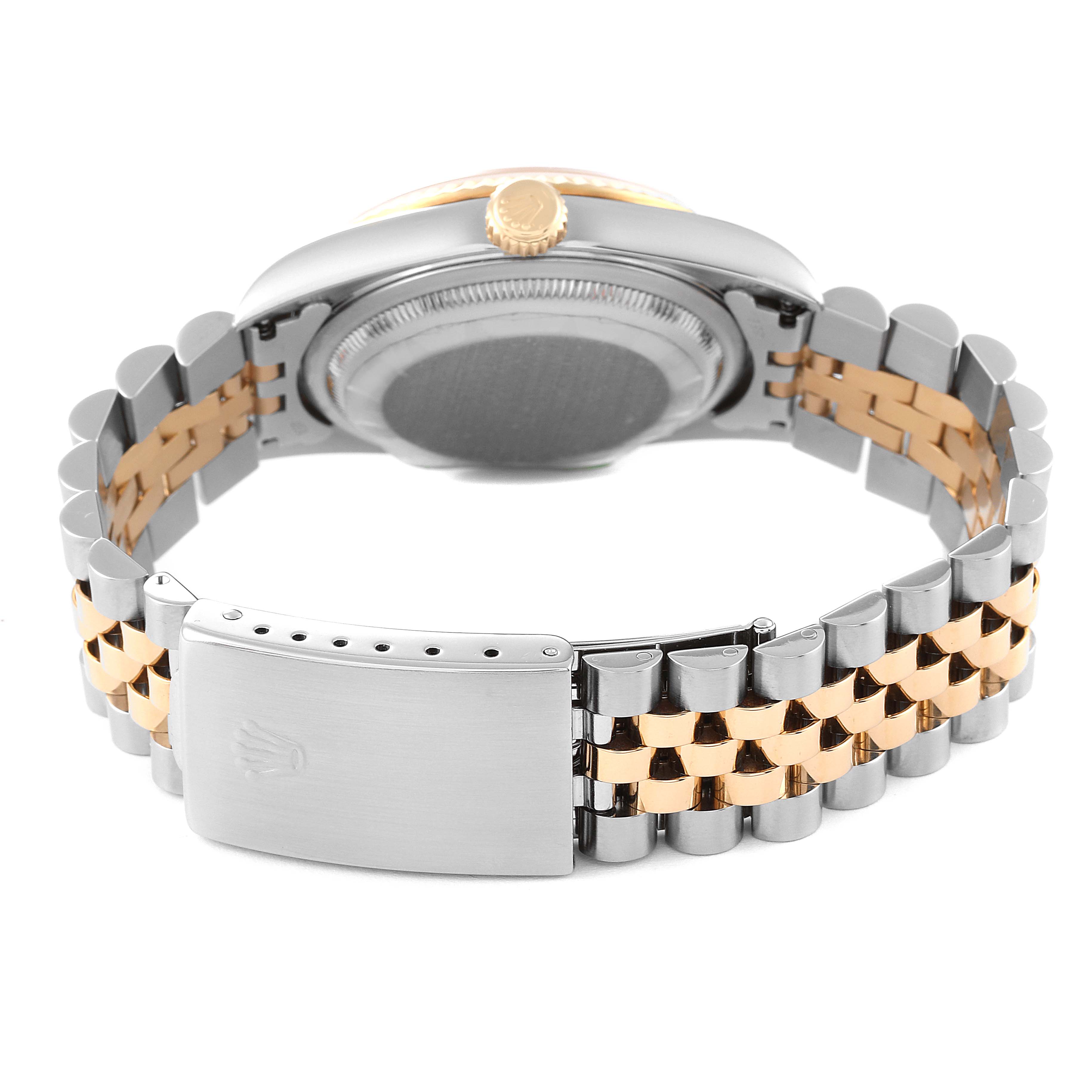 The image shows the back and bracelet of a Rolex Datejust 16233 Men's Steel and Gold (two tone) Mother of Pearl Dial 16233 Men's Steel and Gold (two tone) Mother of Pearl Dial watch, including the crown and clasp.