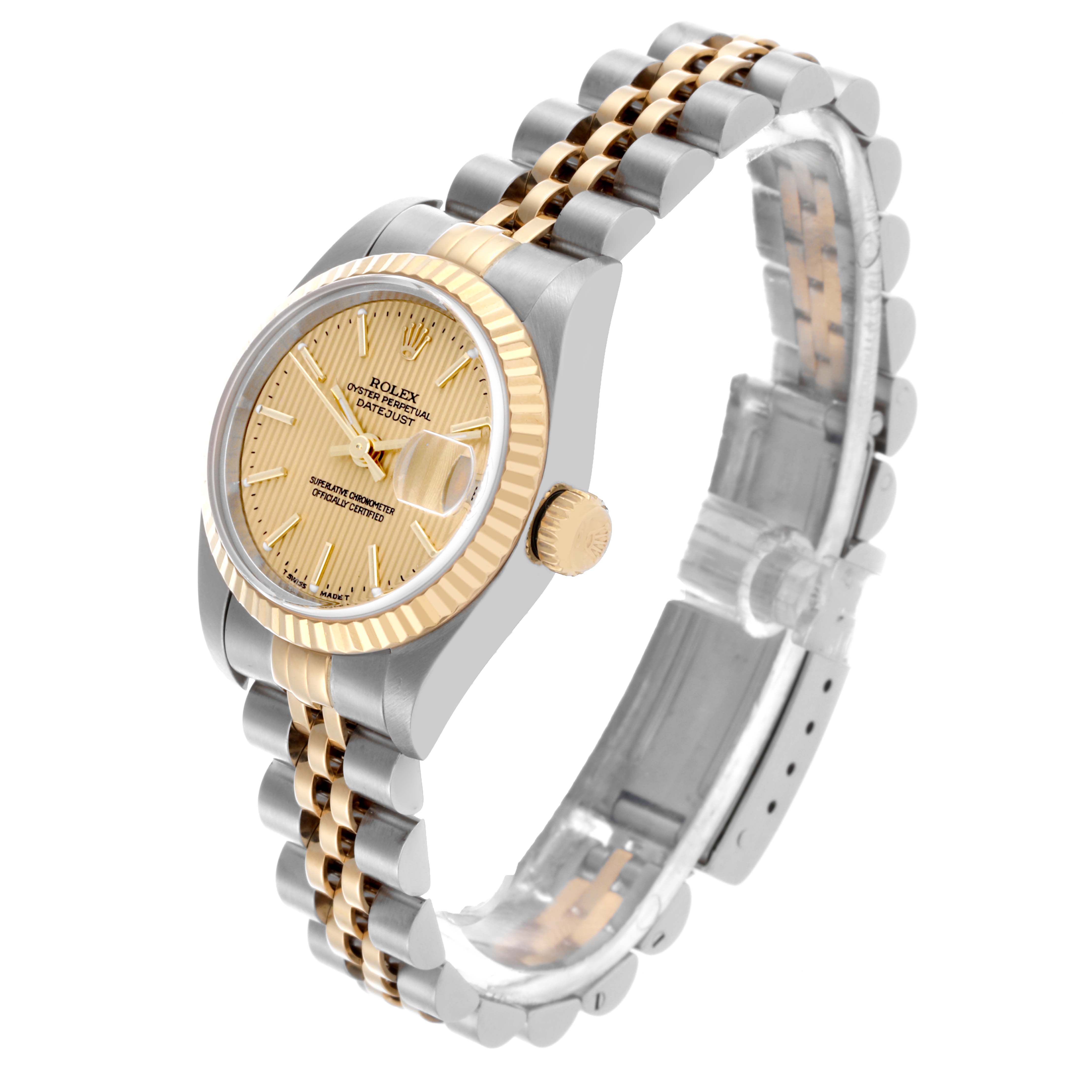 The Rolex Datejust 79173 Women's Steel and Gold (two tone) Champagne Dial 79173 Women's Steel and Gold (two tone) Champagne Dial watch is shown at a three-quarter angle, highlighting the face, bezel, crown, and bracelet.