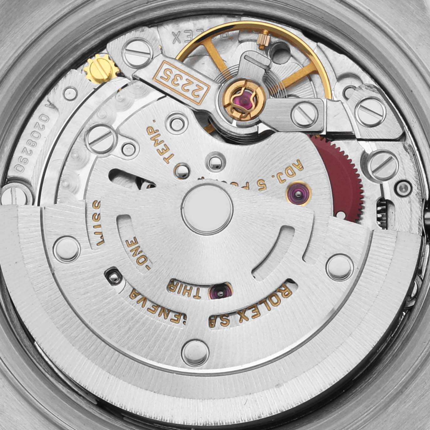 The image shows the movement and inner mechanics of a Rolex Datejust 79173 Women's Steel and Gold (two tone) Champagne Dial 79173 Women's Steel and Gold (two tone) Champagne Dial, featuring gears and balance wheel components.