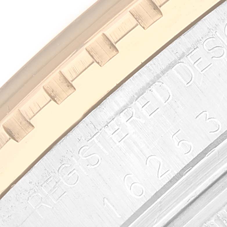 The image shows a close-up angle highlighting the bezel and engraved serial number of a Rolex Vintage Collection 16253 Men's Steel and Gold (two tone) White Dial 16253 Men's Steel and Gold (two tone) White Dial model.