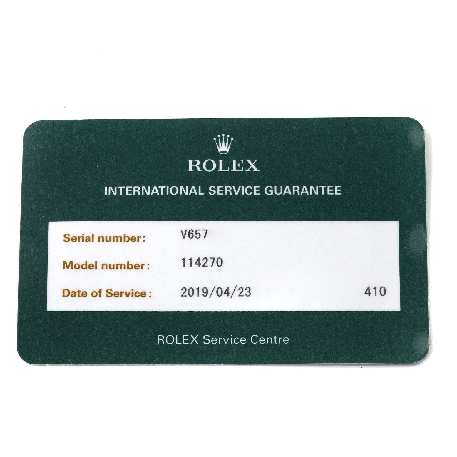 The image shows a Rolex International Service Guarantee card for the Rolex Explorer 114270 Men
s Stainless Steel Black Dial 114270 Men
s Stainless Steel Black Dial model 114270.