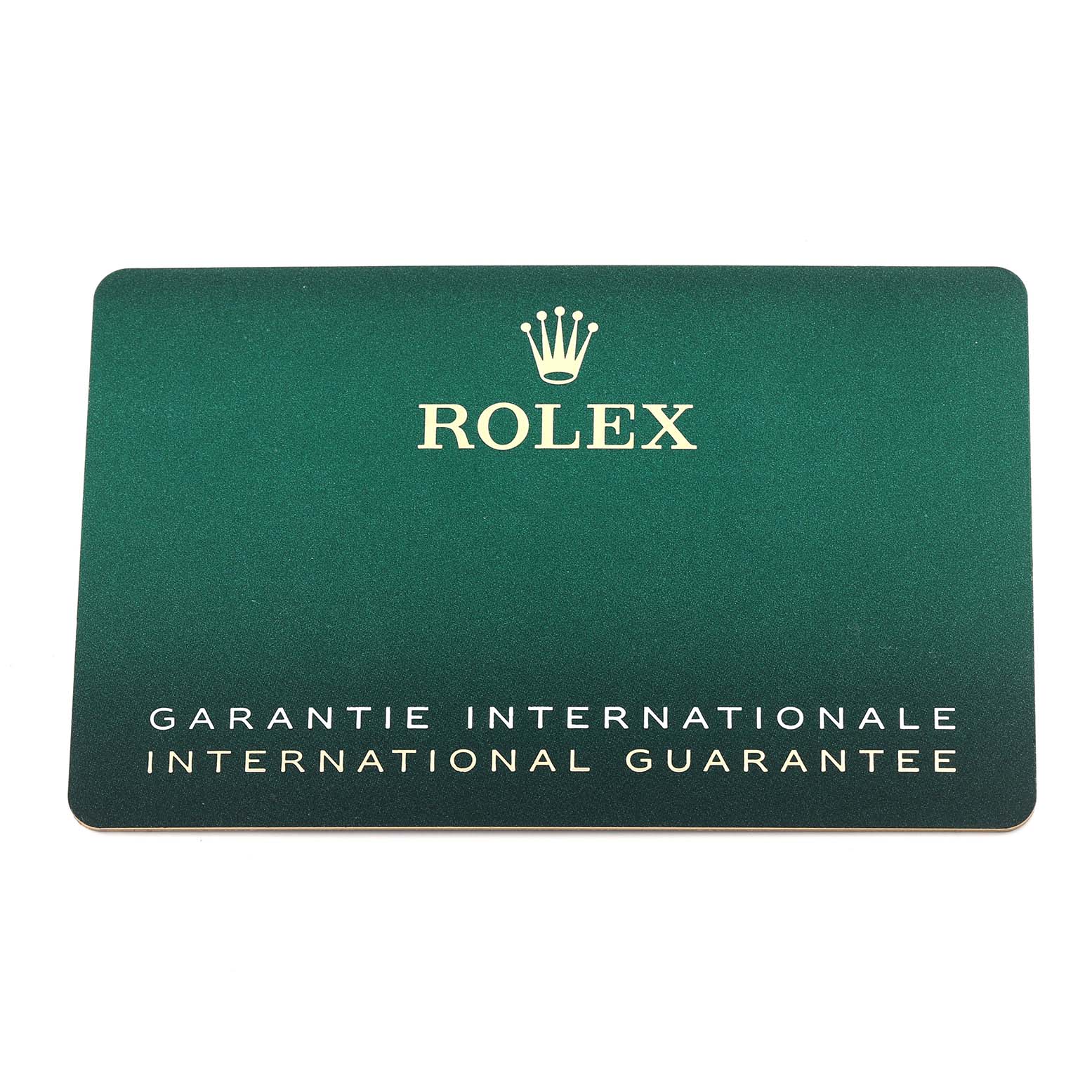 The image shows the international guarantee card for the Rolex Explorer M226570-0002 Men's Stainless Steel Black Dial M226570-0002 Men's Stainless Steel Black Dial, displayed flat with the brand logo and text visible.