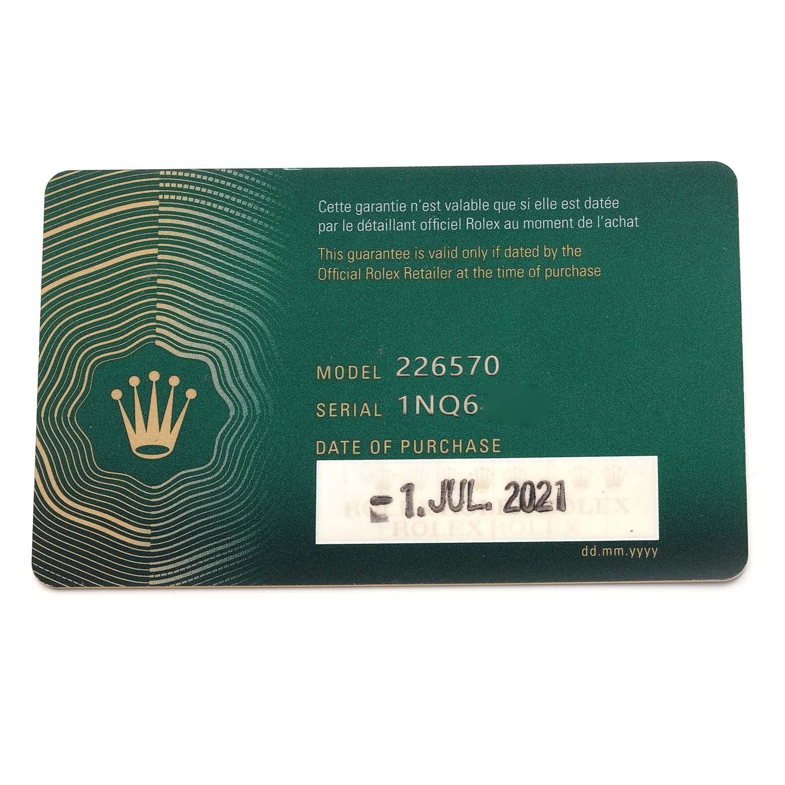 This image shows a green Rolex warranty card for the Explorer model 226570, with serial number and purchase date indicated.