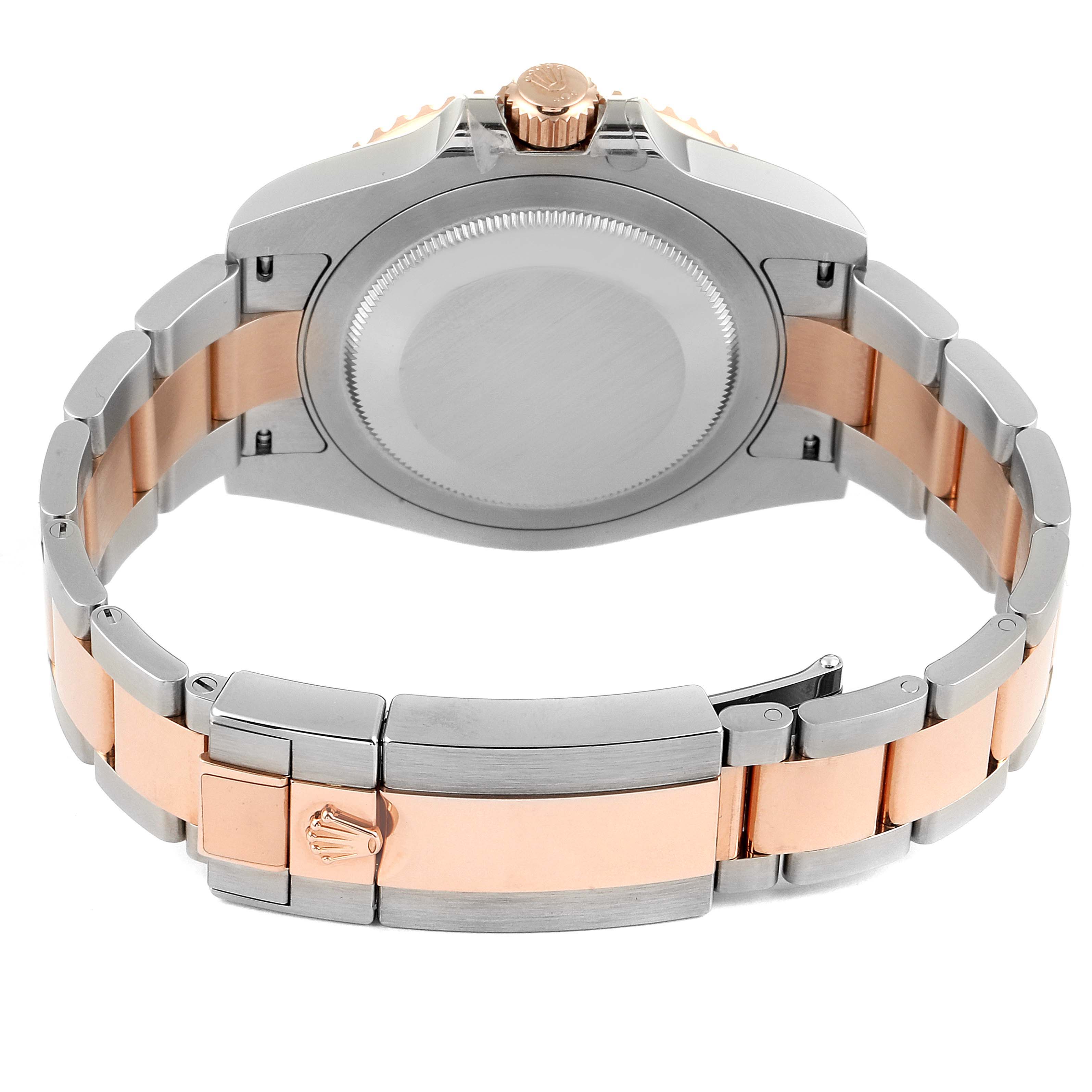 This image shows the back case and bracelet of a Rolex GMT-Master 126711 Men
s Rose Gold Black Dial 126711 Men
s Rose Gold Black Dial watch.