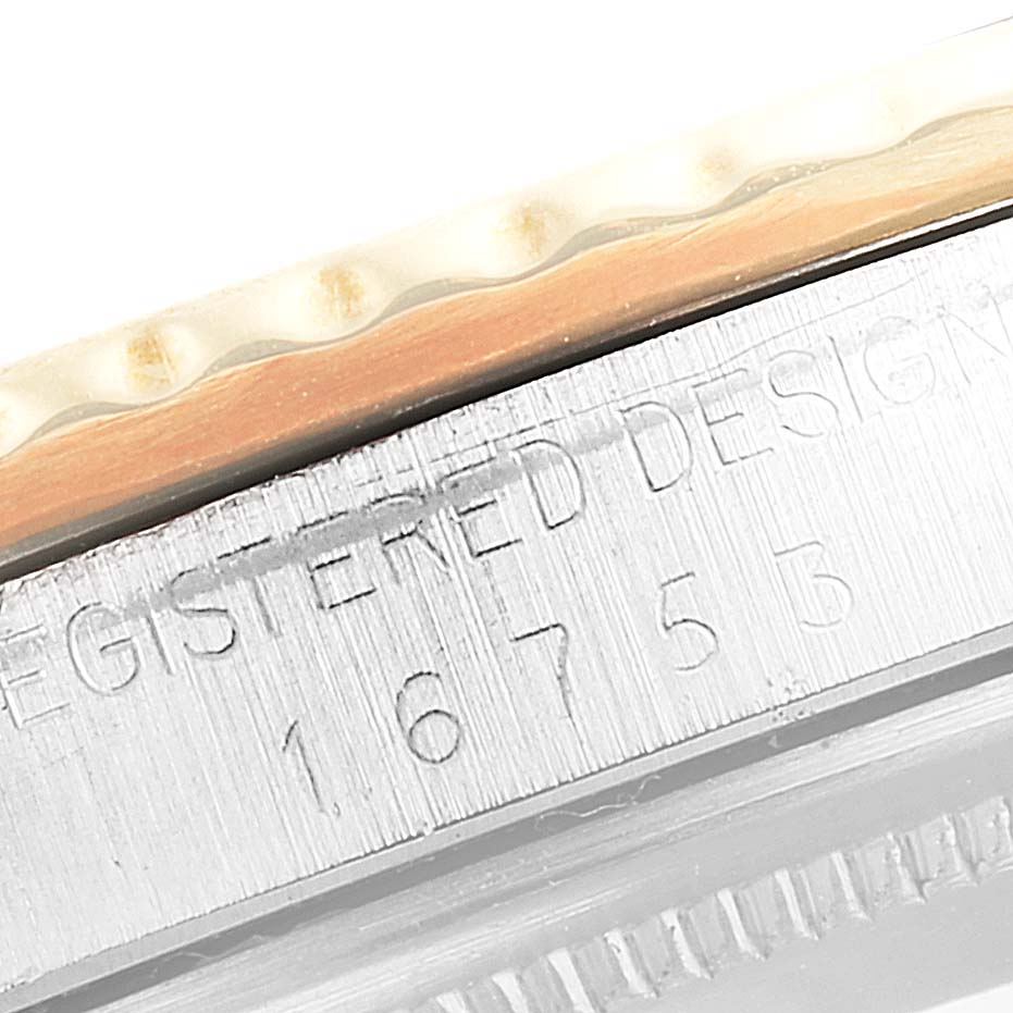 This image shows a close-up of the numbering and edges of a Rolex Vintage Collection 16753 Men's Steel and Gold (two tone) Black Dial 16753 Men's Steel and Gold (two tone) Black Dial model watch.