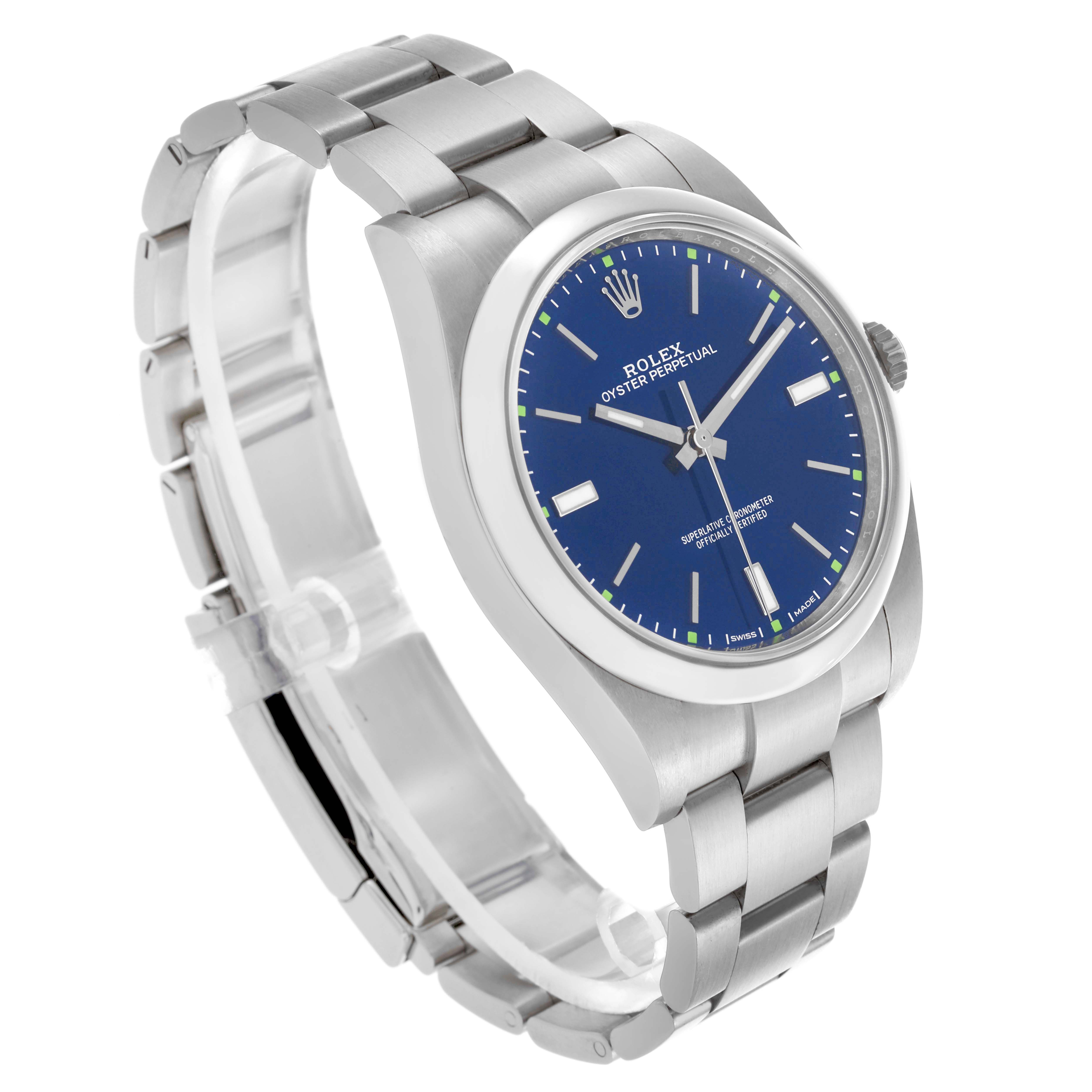 The Rolex Oyster Perpetual 114300 Men's Stainless Steel Blue Dial 114300 Men's Stainless Steel Blue Dial watch is shown at a three-quarter angle, highlighting the blue dial, bracelet, and bezel.